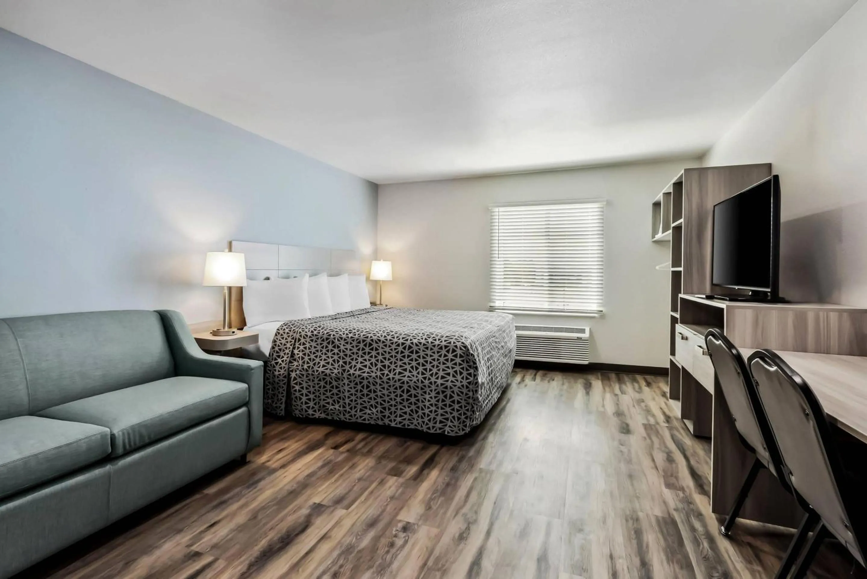 Bedroom, Bed in WoodSpring Suites Sumter near Shaw AFB