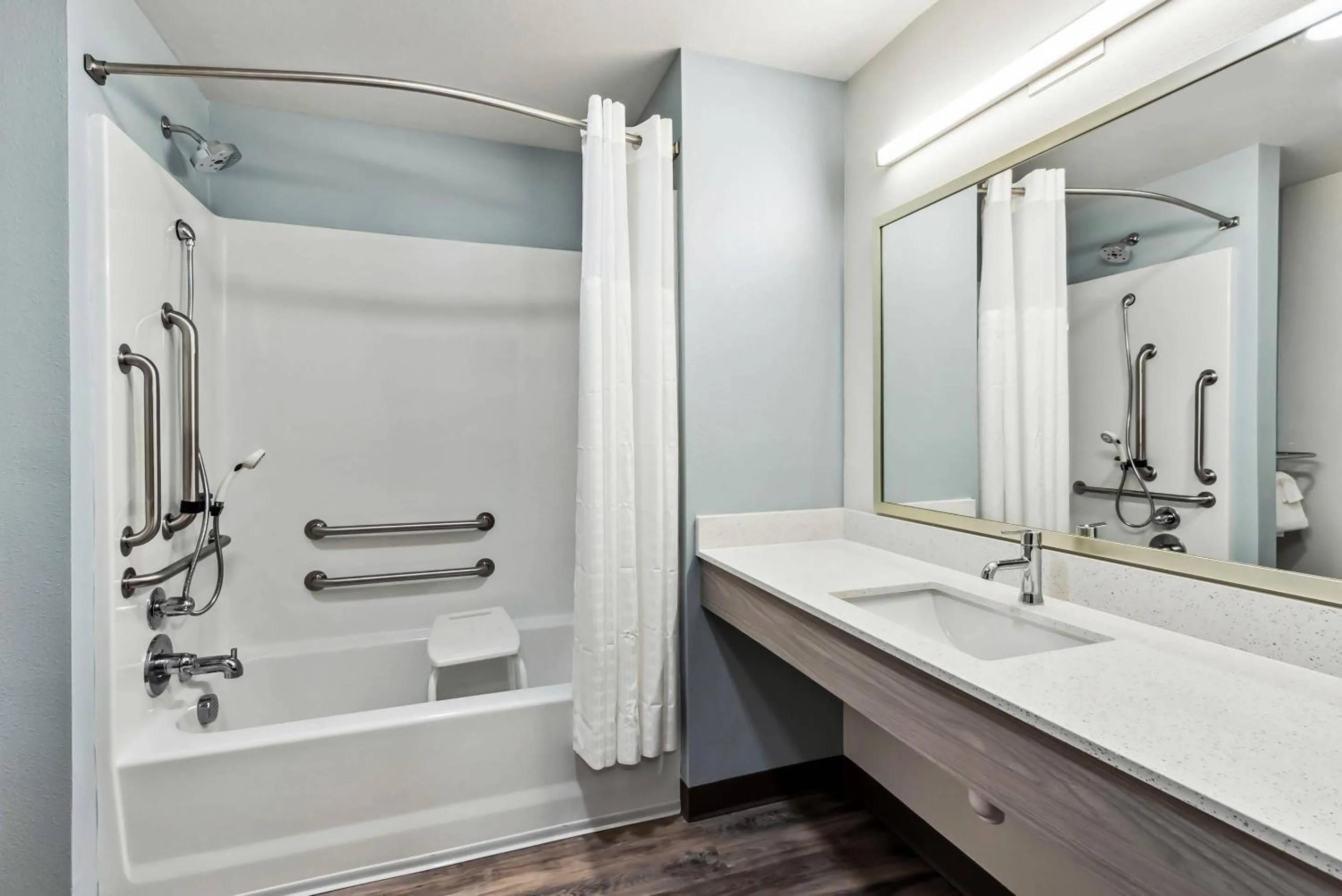 Bedroom in WoodSpring Suites Sumter near Shaw AFB