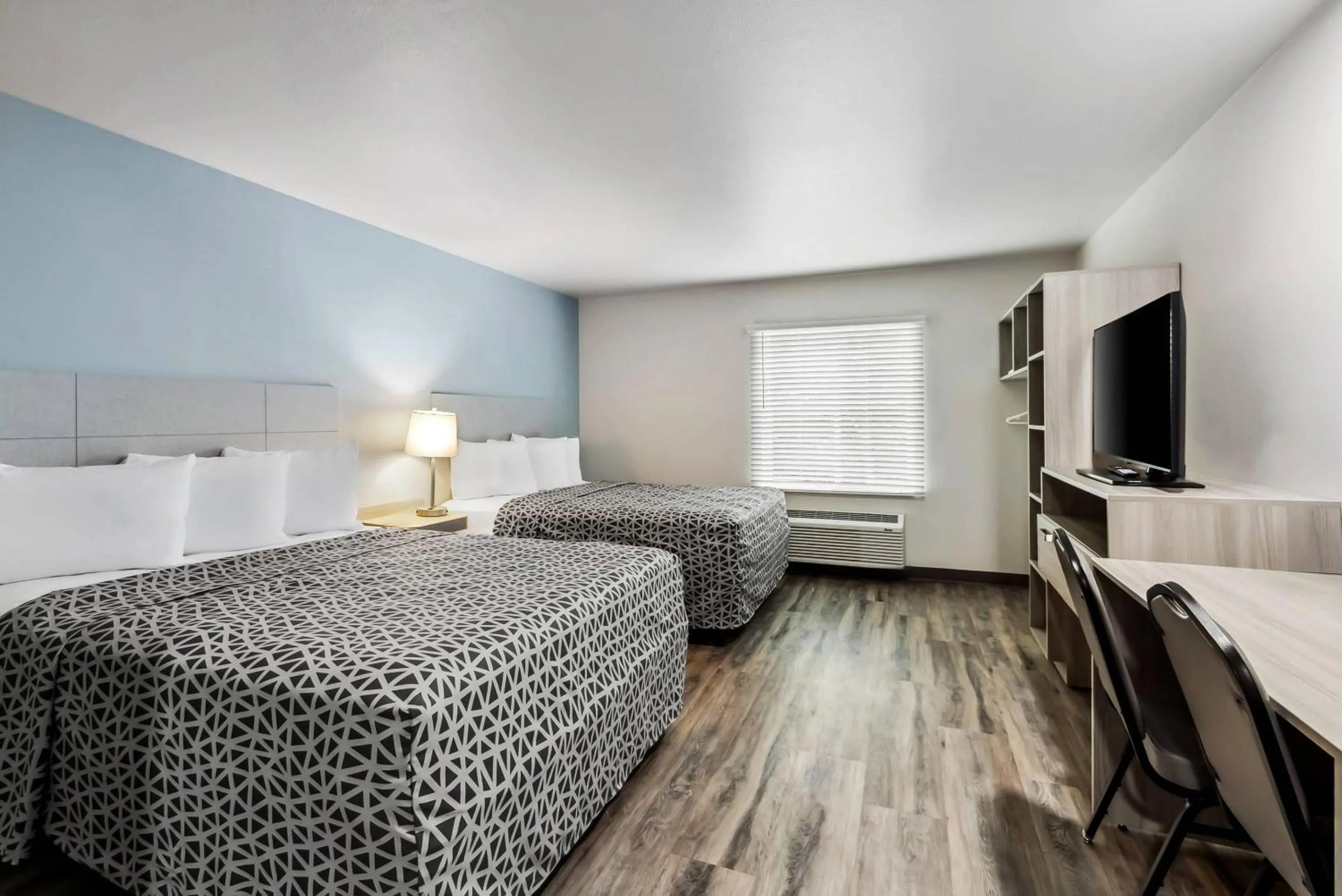 Bedroom, Bed in WoodSpring Suites Sumter near Shaw AFB