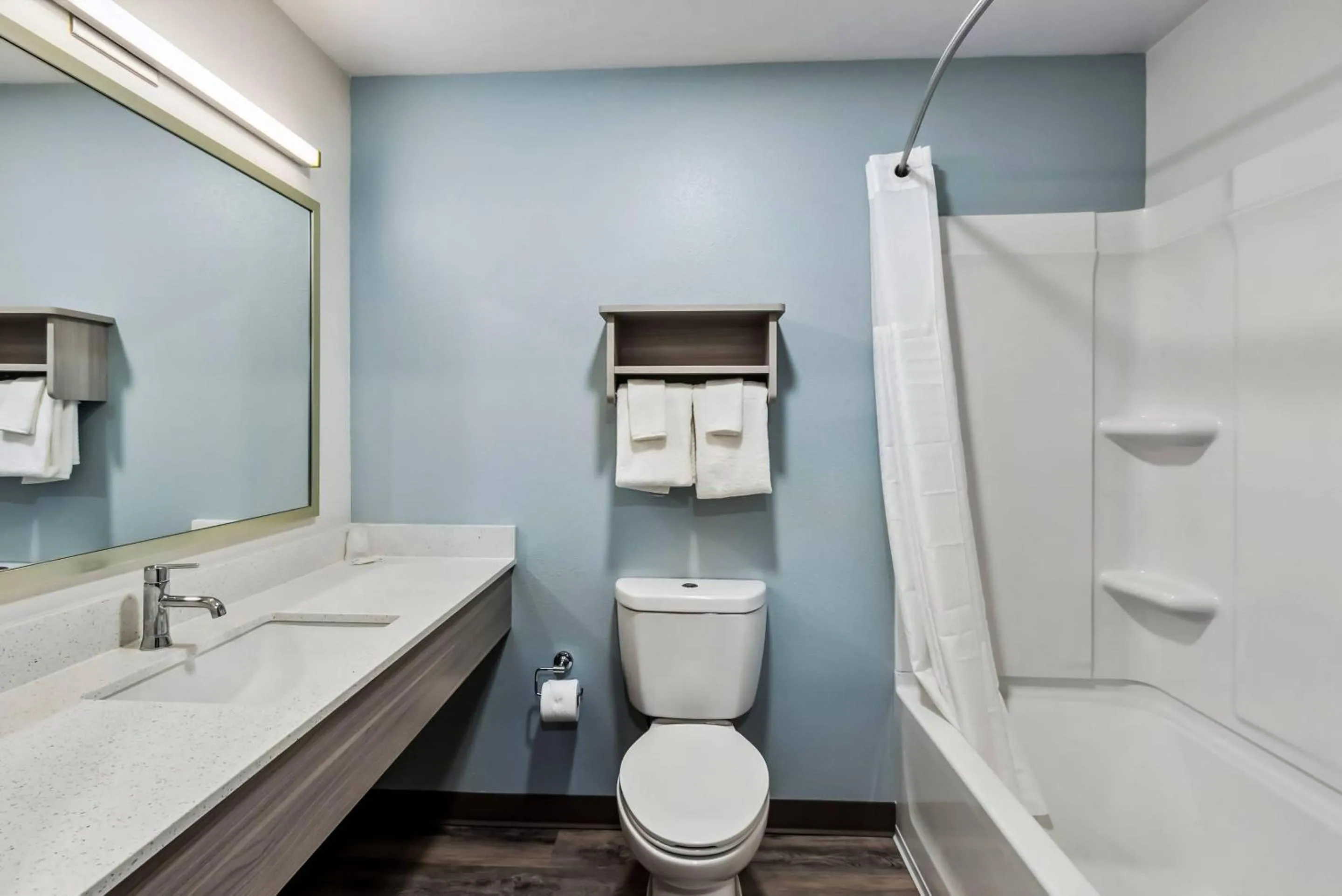 Bedroom in WoodSpring Suites Sumter near Shaw AFB