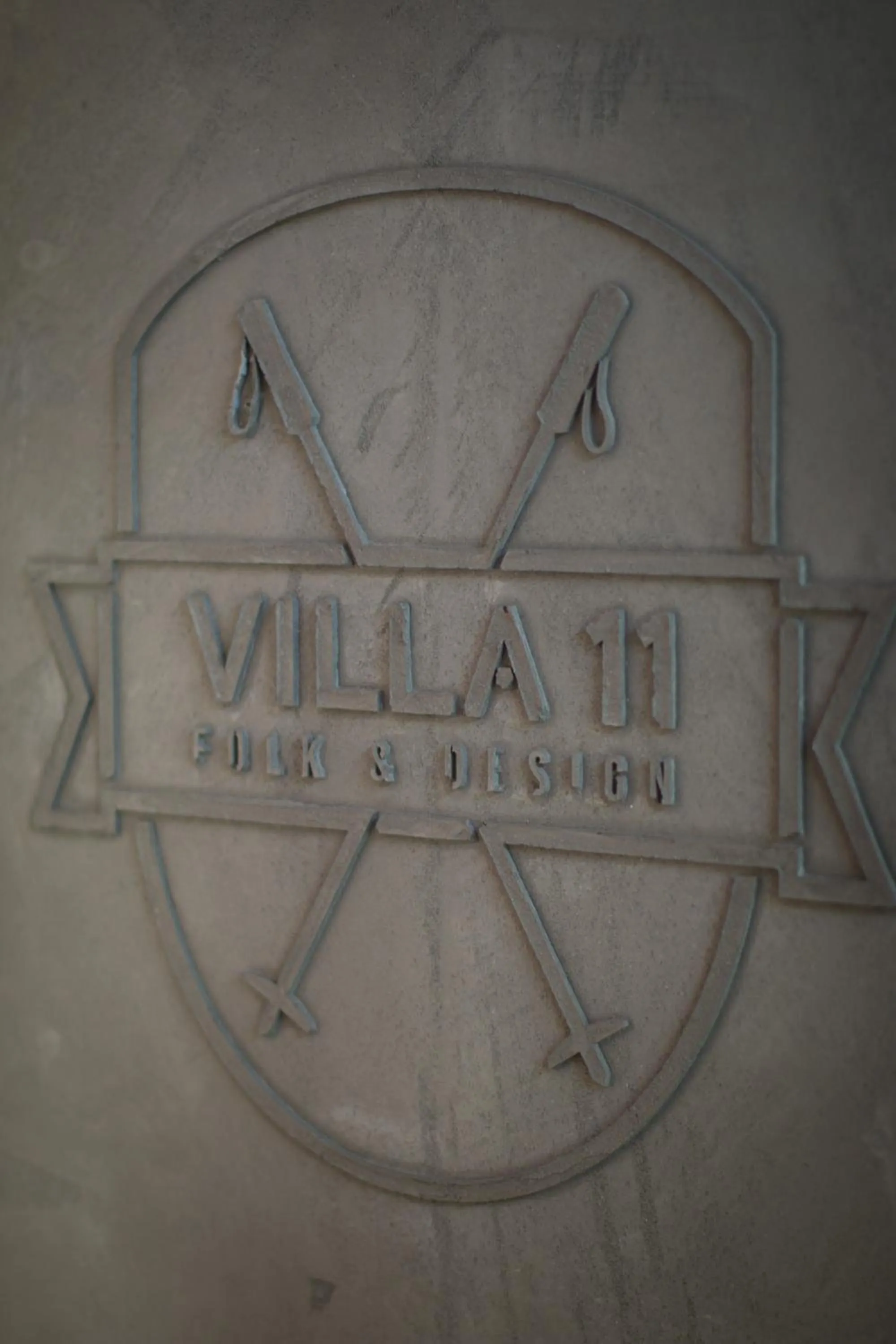 Property logo or sign in Villa 11 Folk & Design