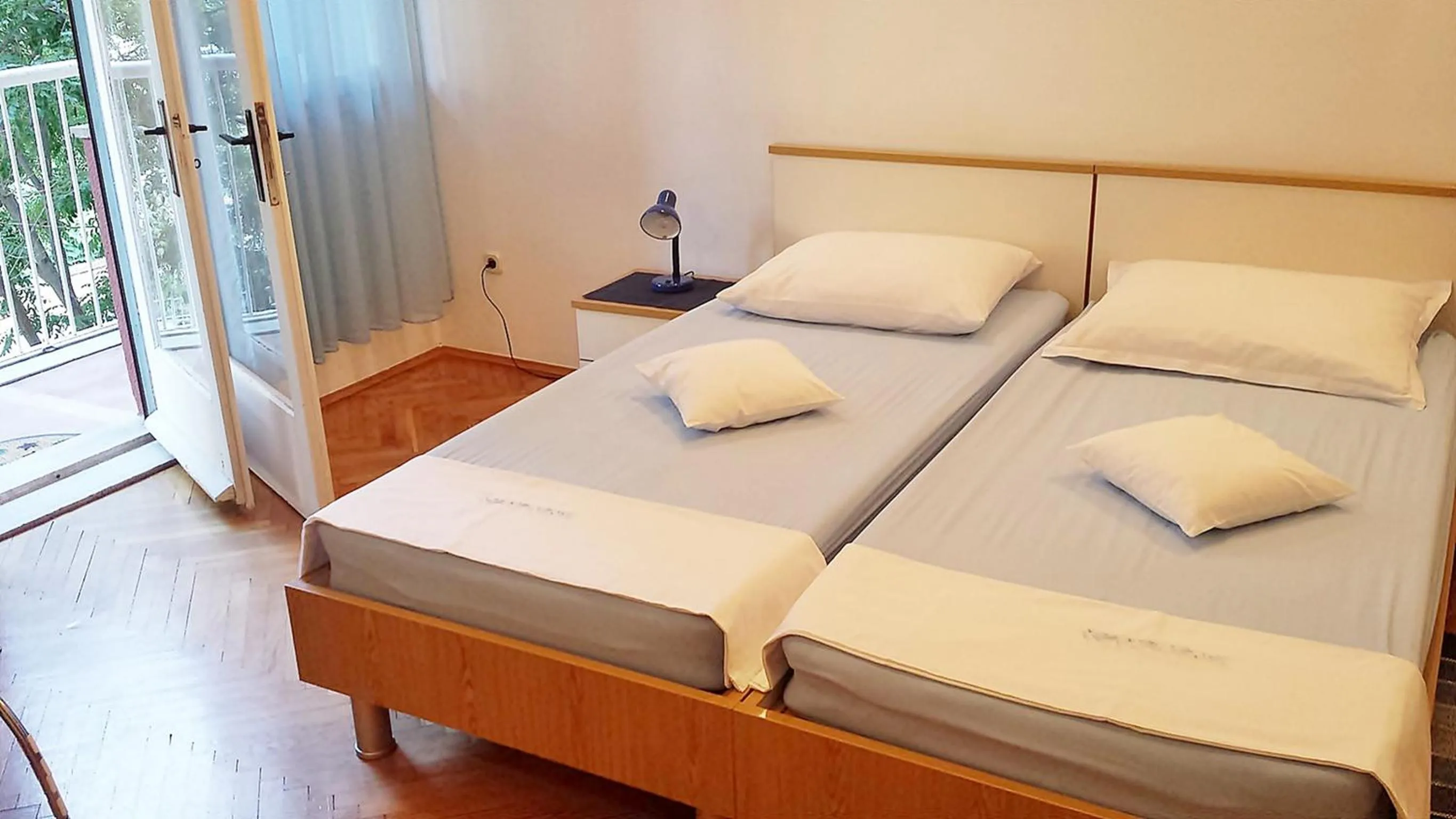 Bed in Klarina Apartments