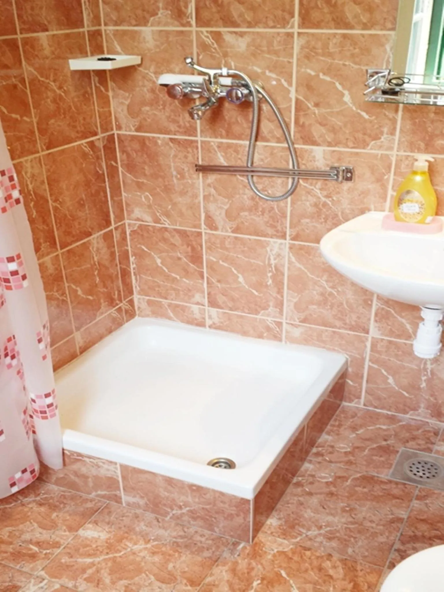 Bathroom in Klarina Apartments