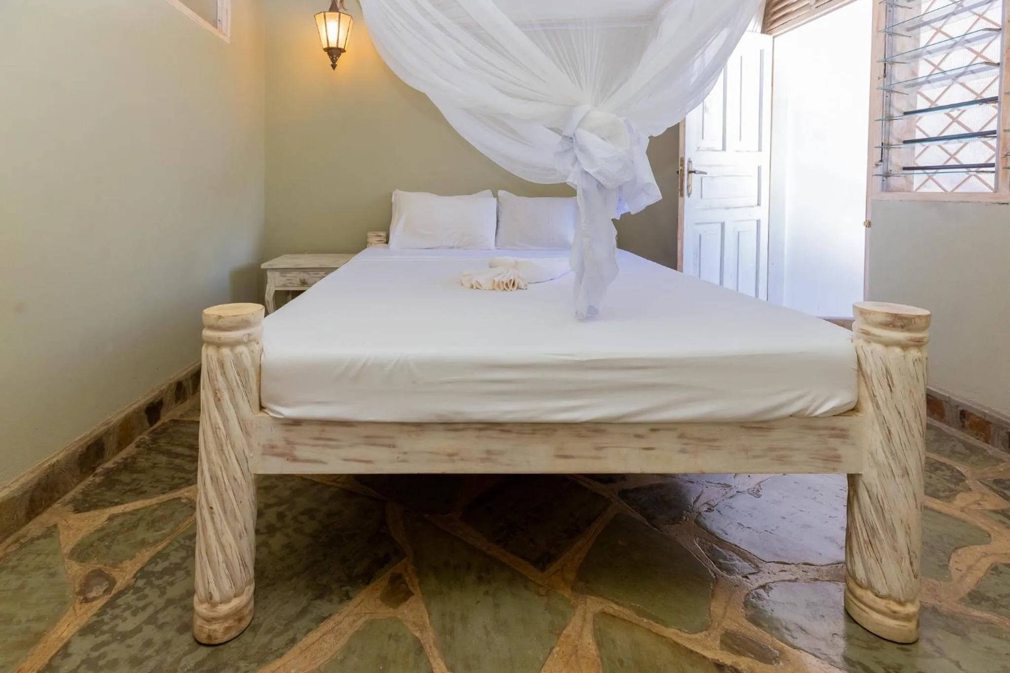 Bed in Silver Rock Boutique Resort by Mokawa - Hotel & Apartments