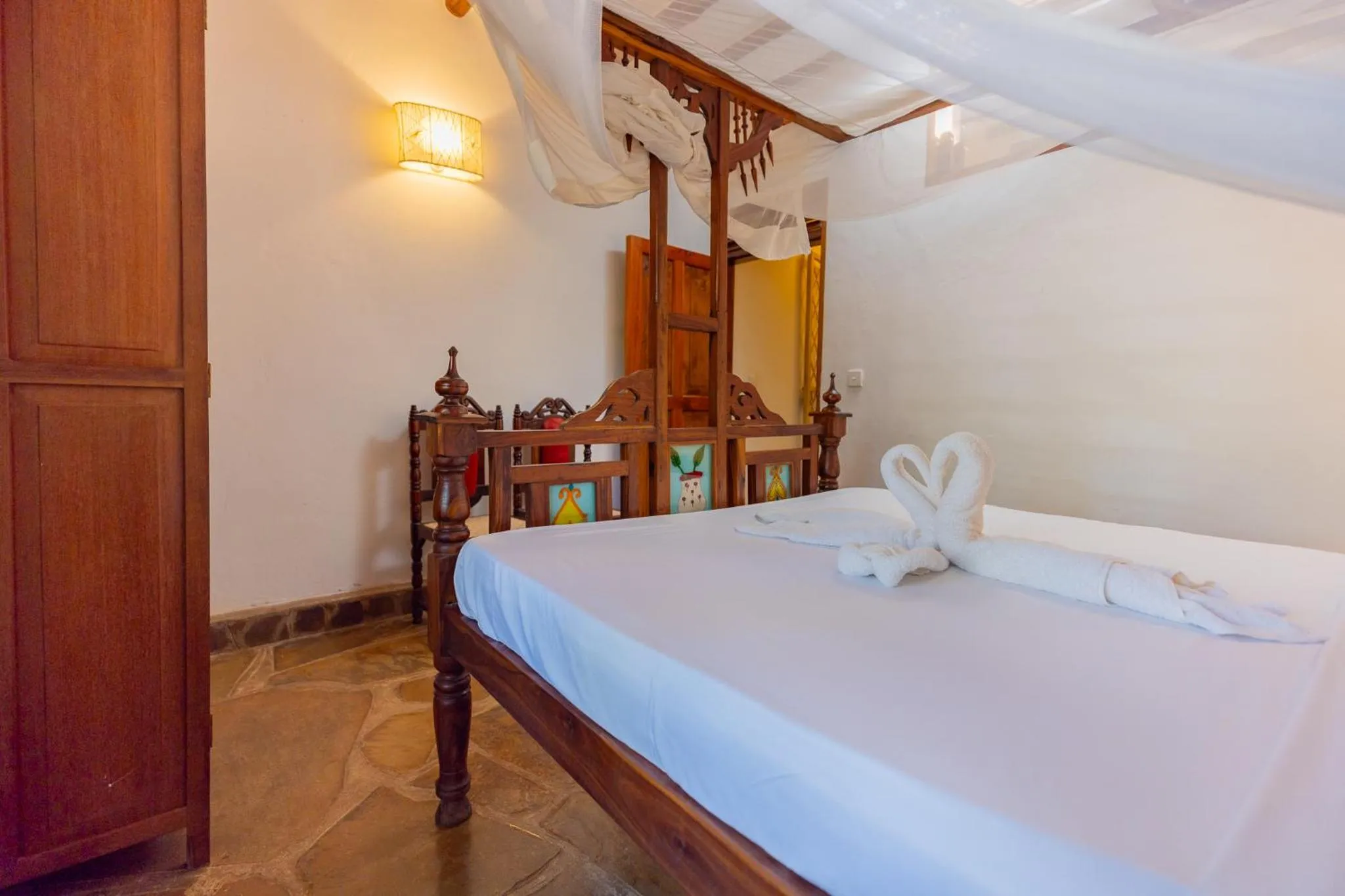 Bed in Silver Rock Boutique Resort by Mokawa - Hotel & Apartments