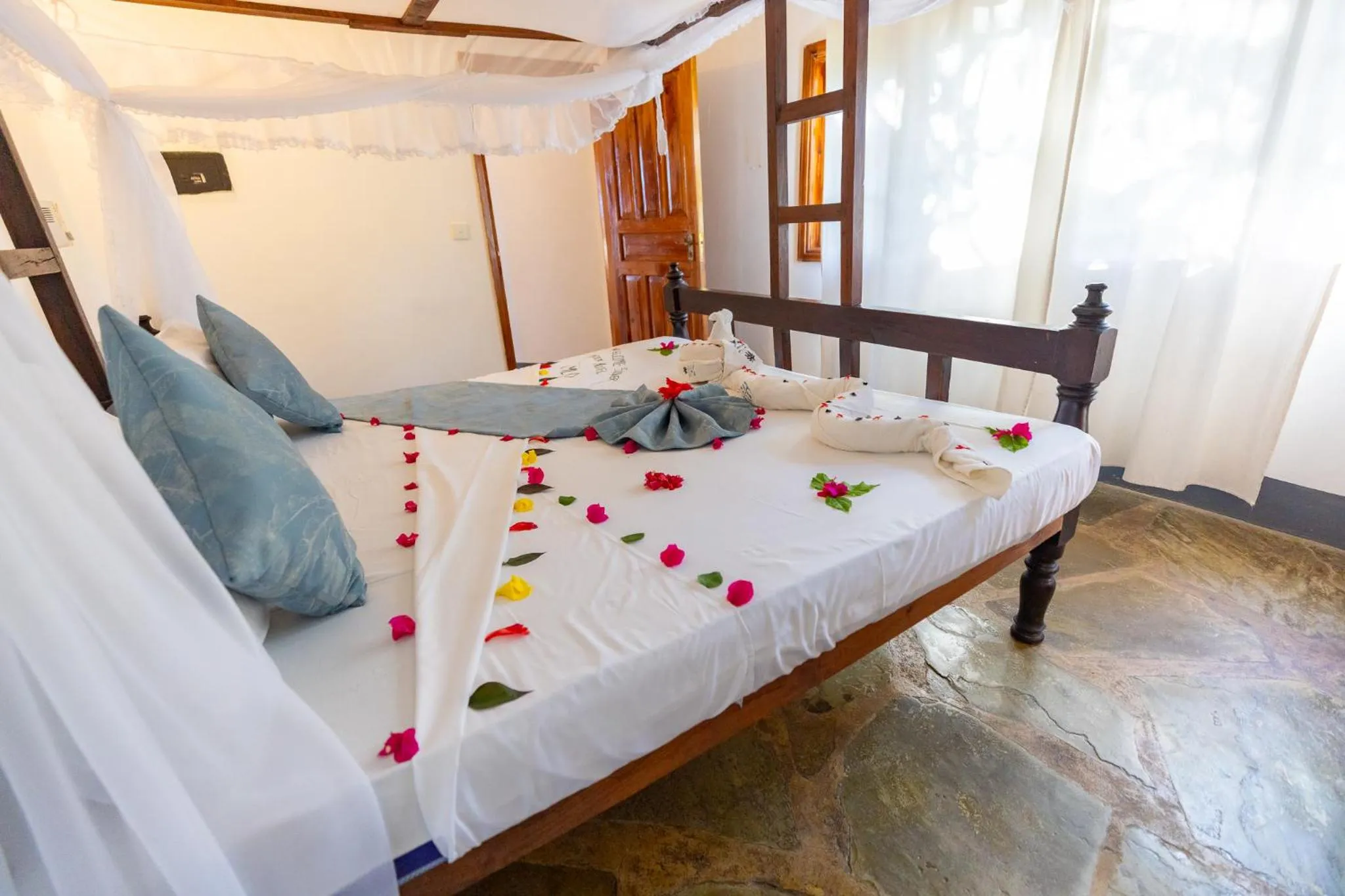 Bed in Silver Rock Boutique Resort by Mokawa - Hotel & Apartments