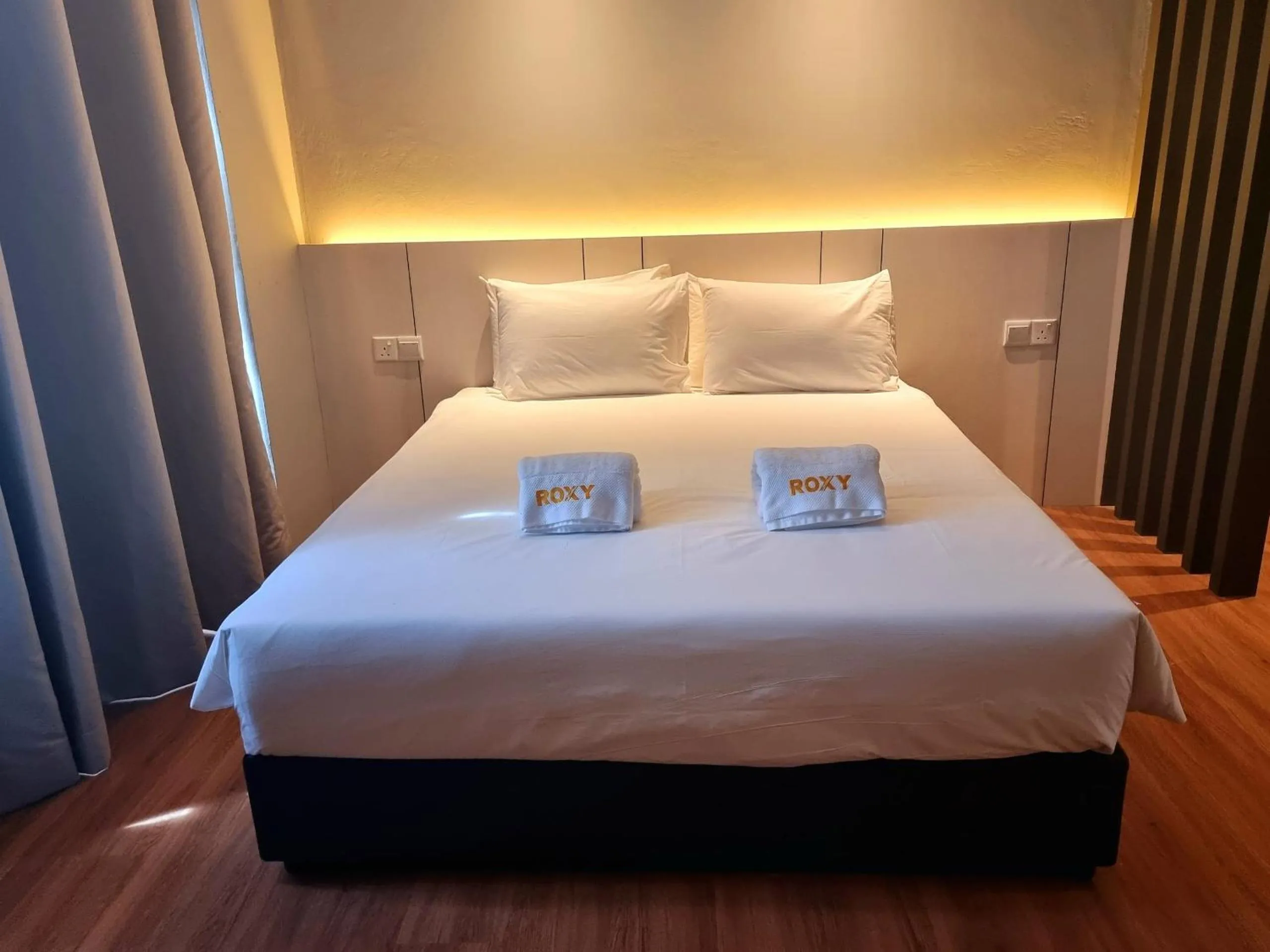 Bed in Roxy Hotel Malihah