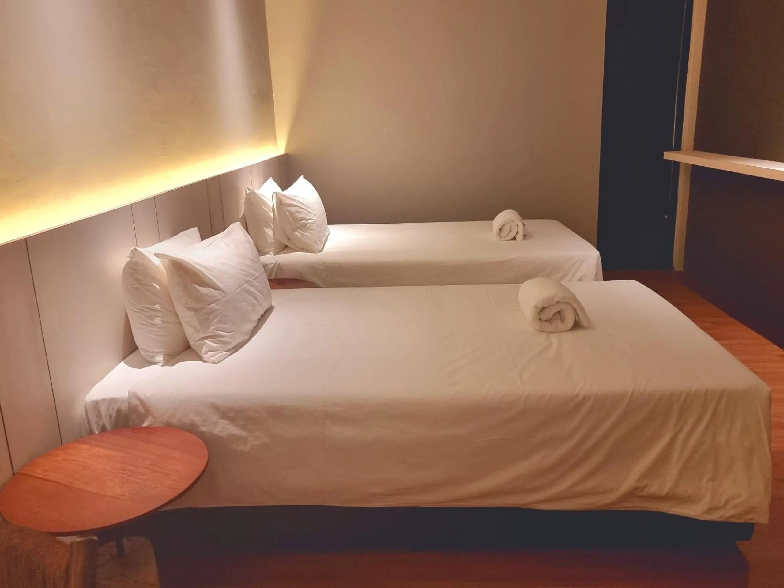 Bed in Roxy Hotel Malihah