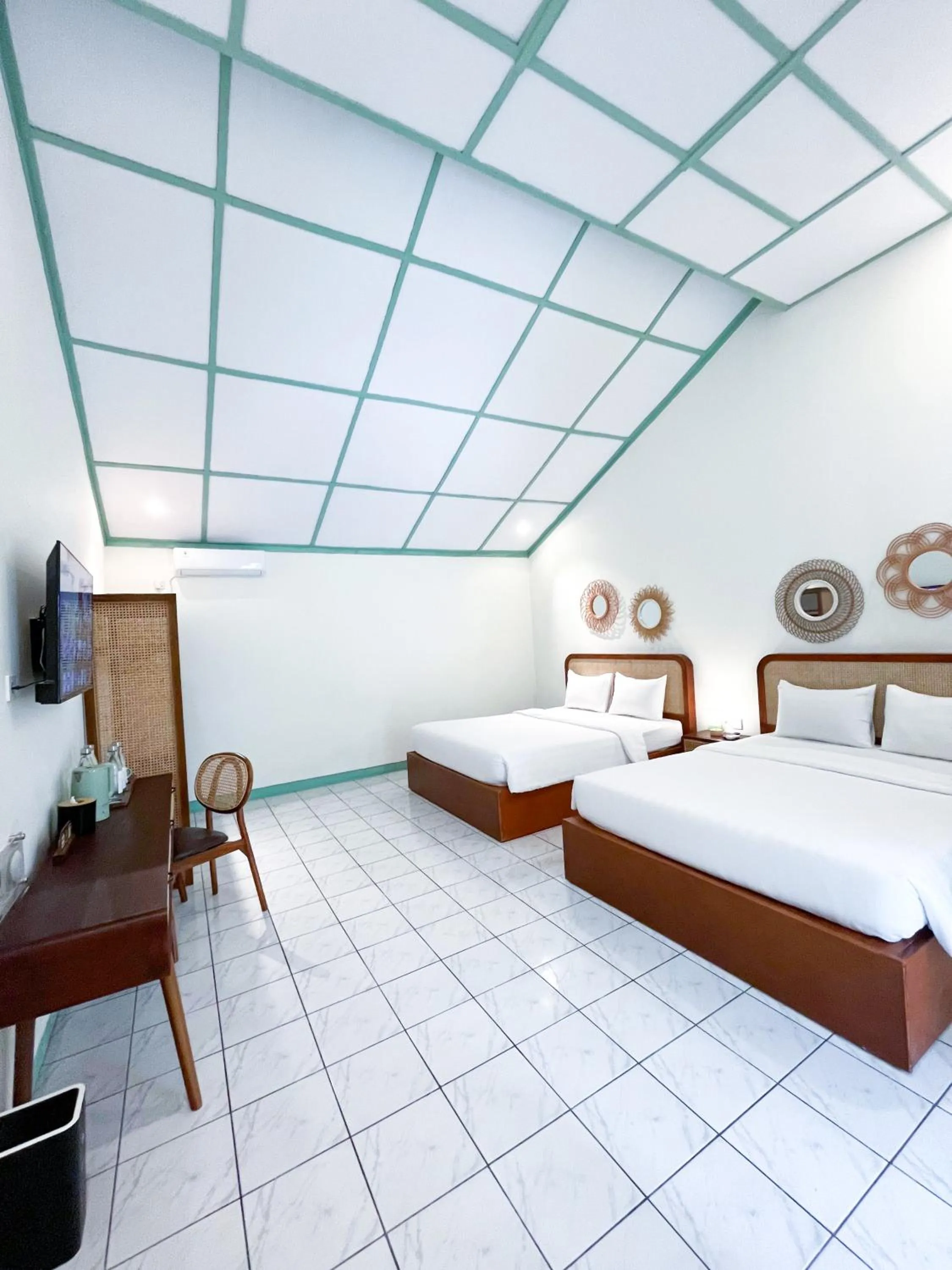 Bed in The Utara Hotel Tugu by Eresha Hospitality