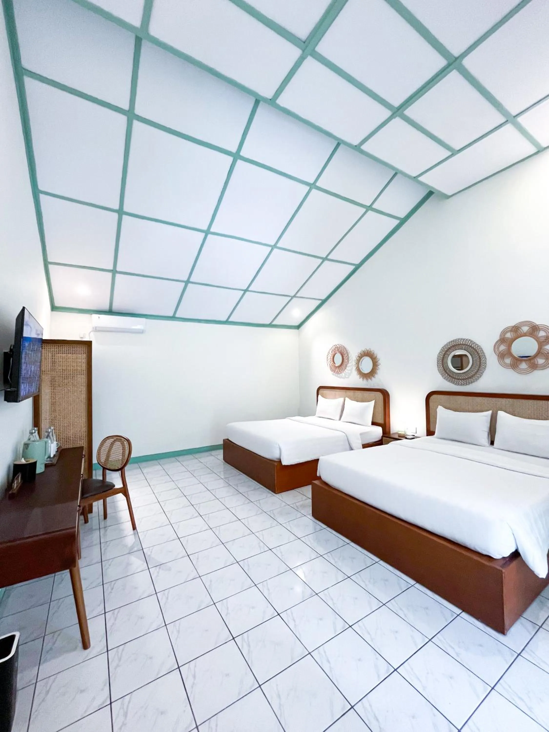 Bed in The Utara Hotel Tugu by Eresha Hospitality