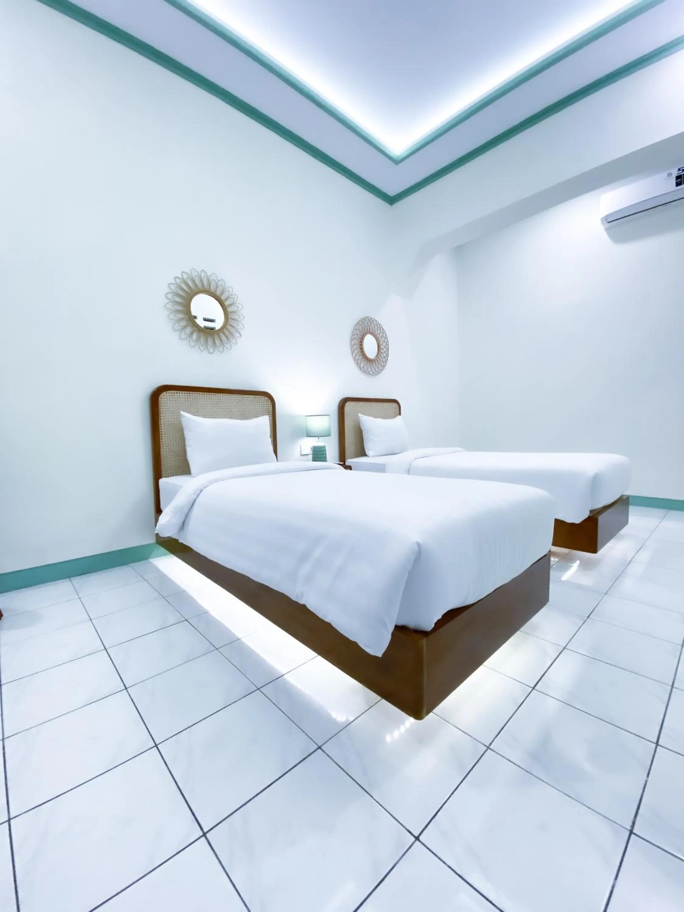 Bed in The Utara Hotel Tugu by Eresha Hospitality