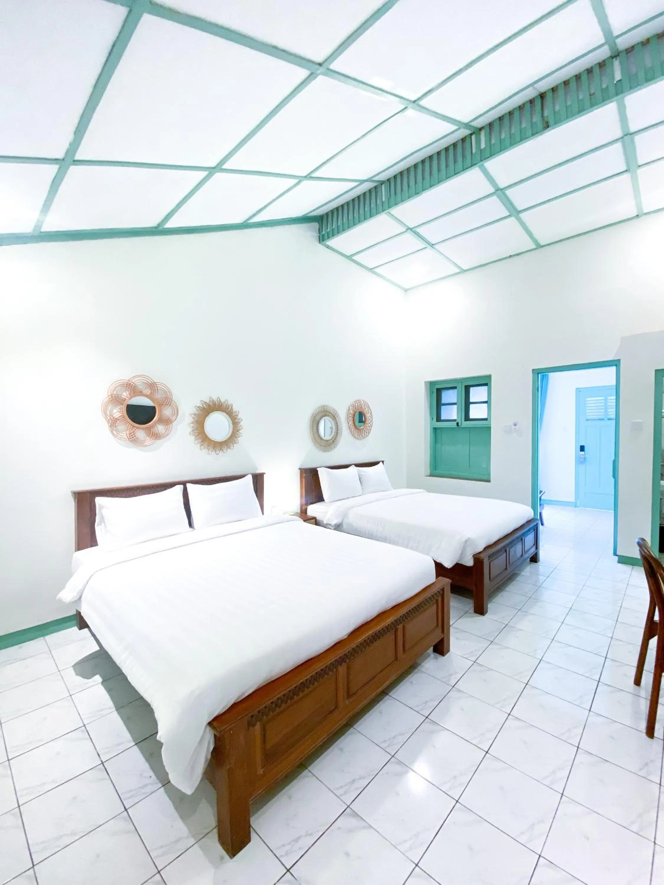 Bed in The Utara Hotel Tugu by Eresha Hospitality