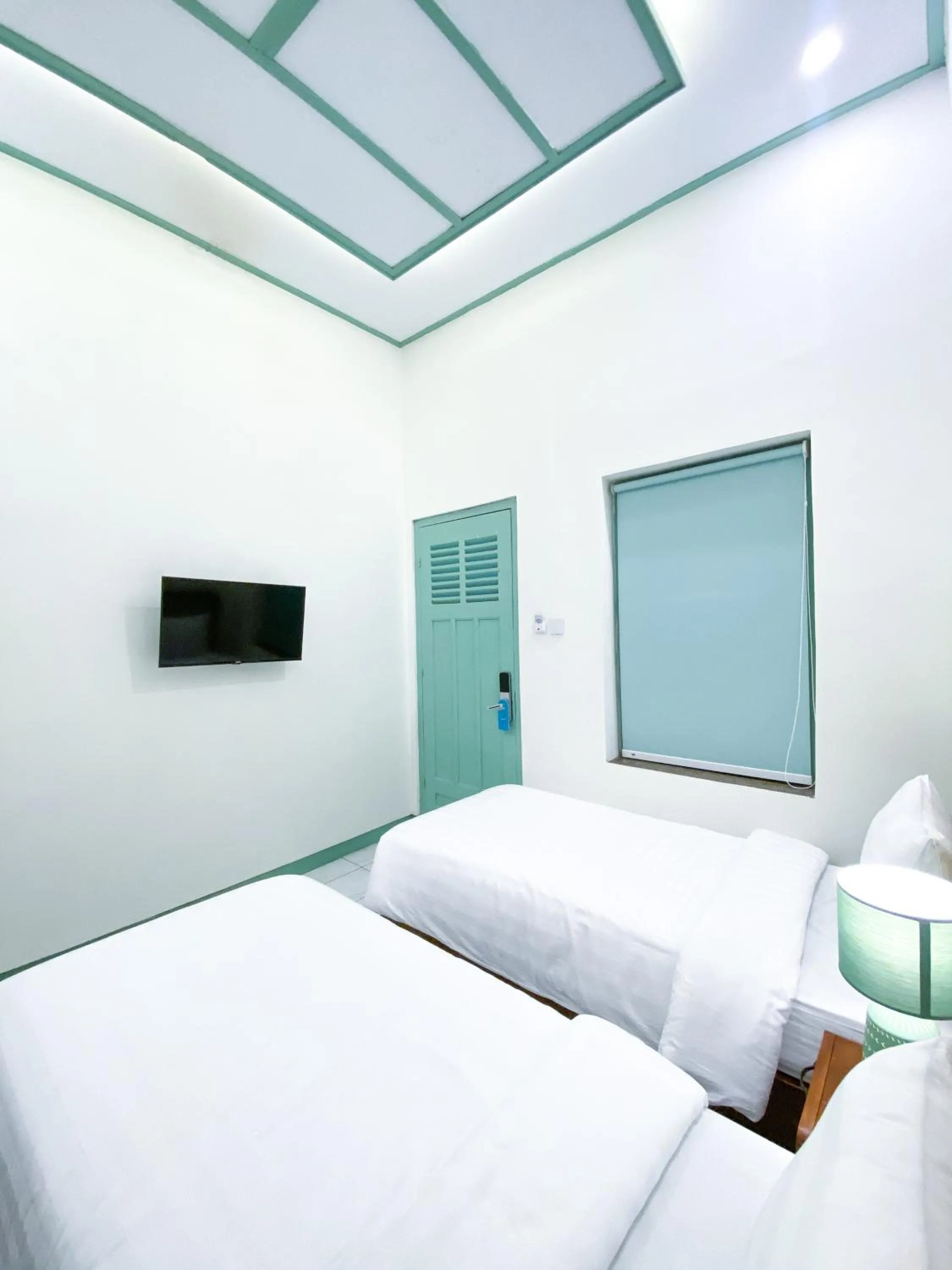 Bed in The Utara Hotel Tugu by Eresha Hospitality