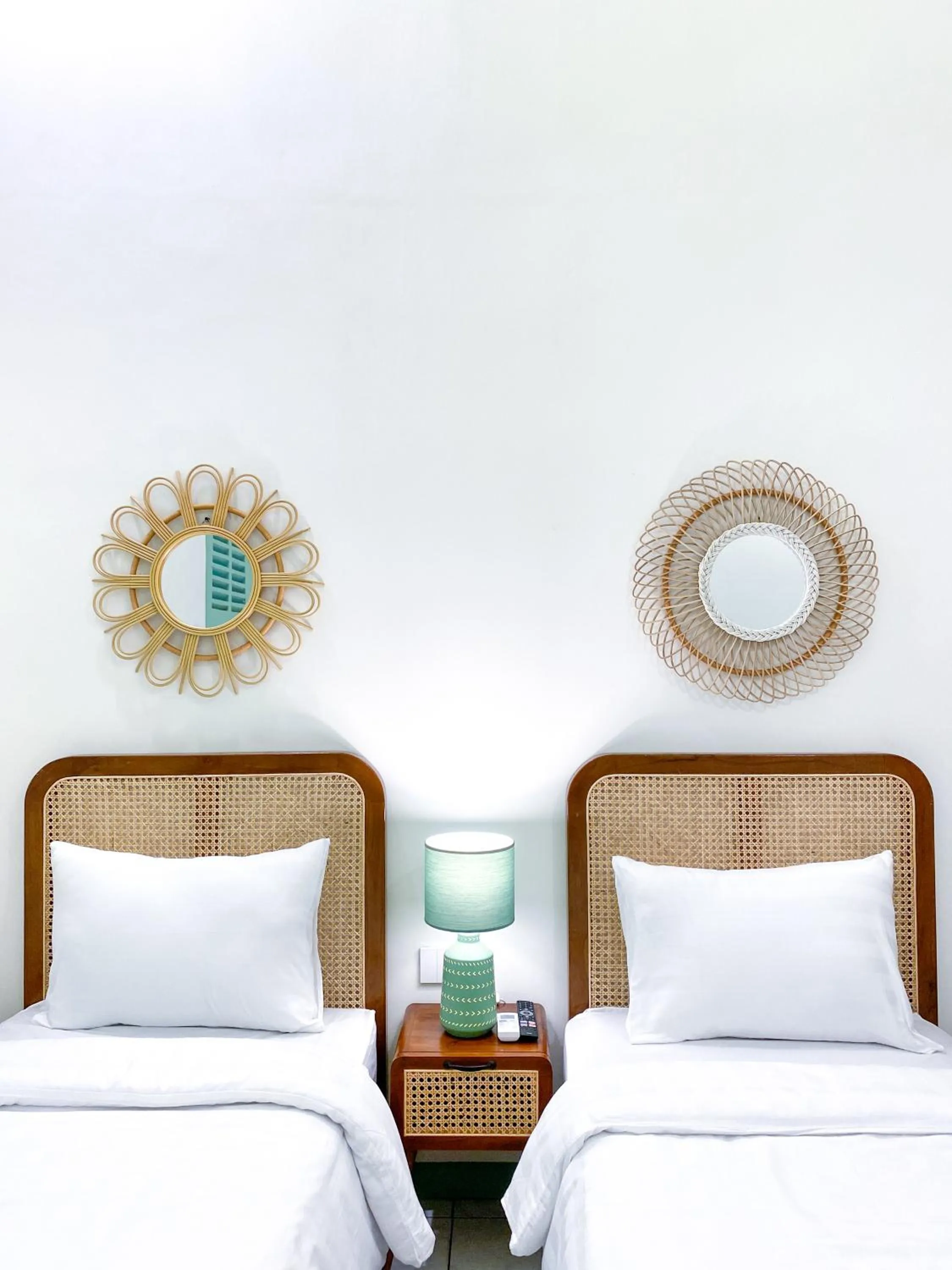 Bed in The Utara Hotel Tugu by Eresha Hospitality