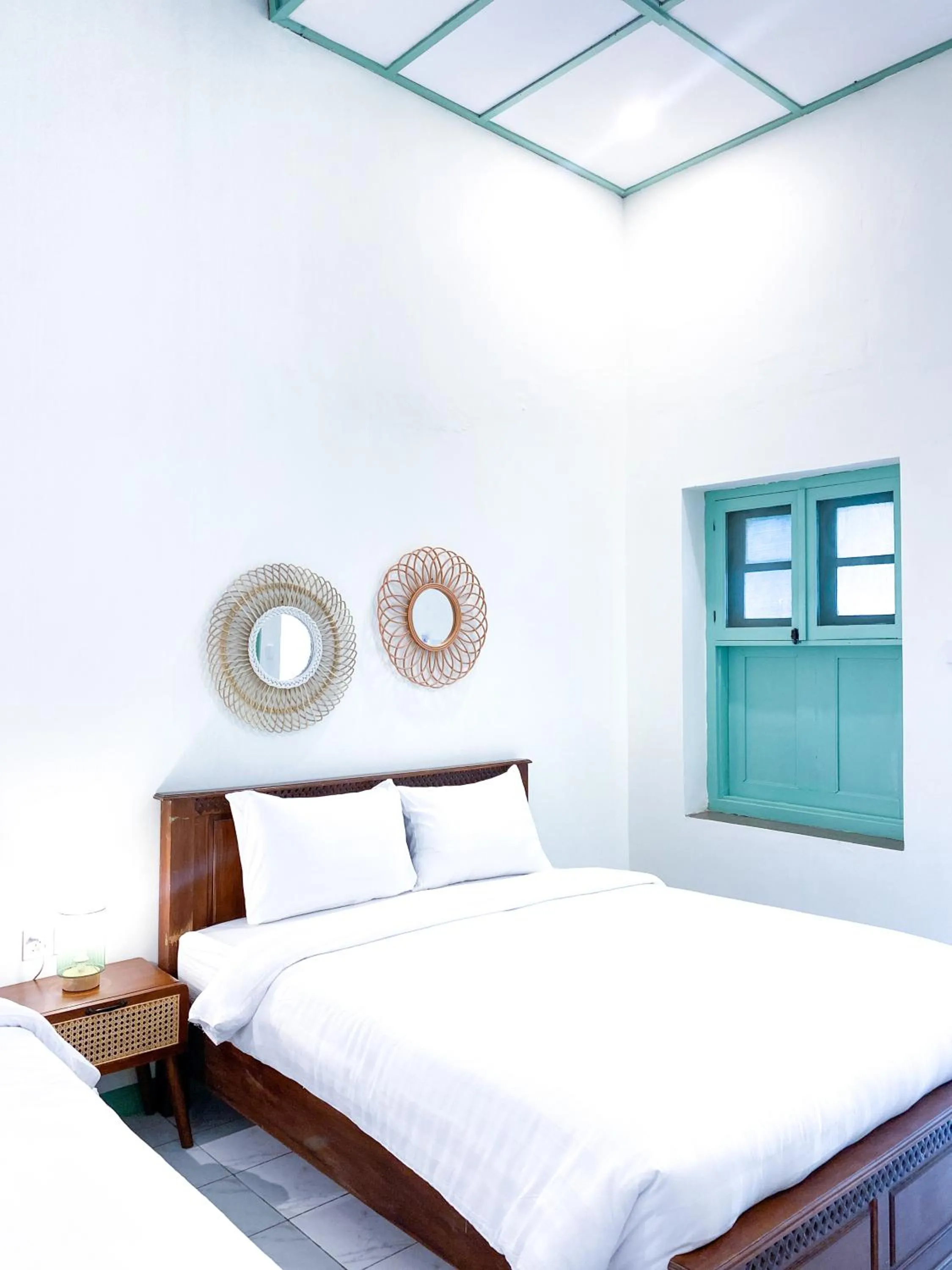 Bed in The Utara Hotel Tugu by Eresha Hospitality