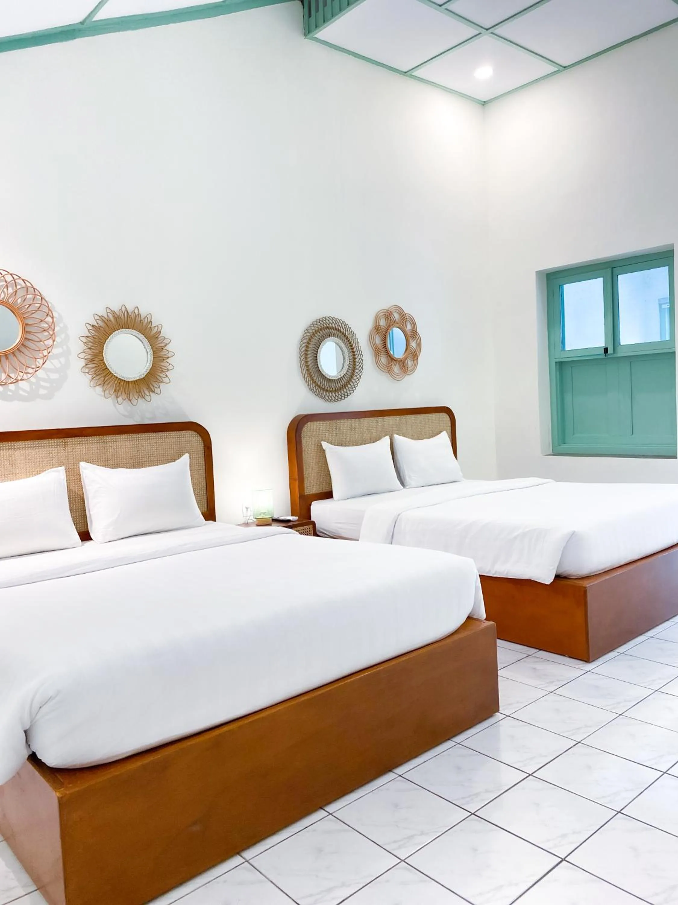 Bed in The Utara Hotel Tugu by Eresha Hospitality