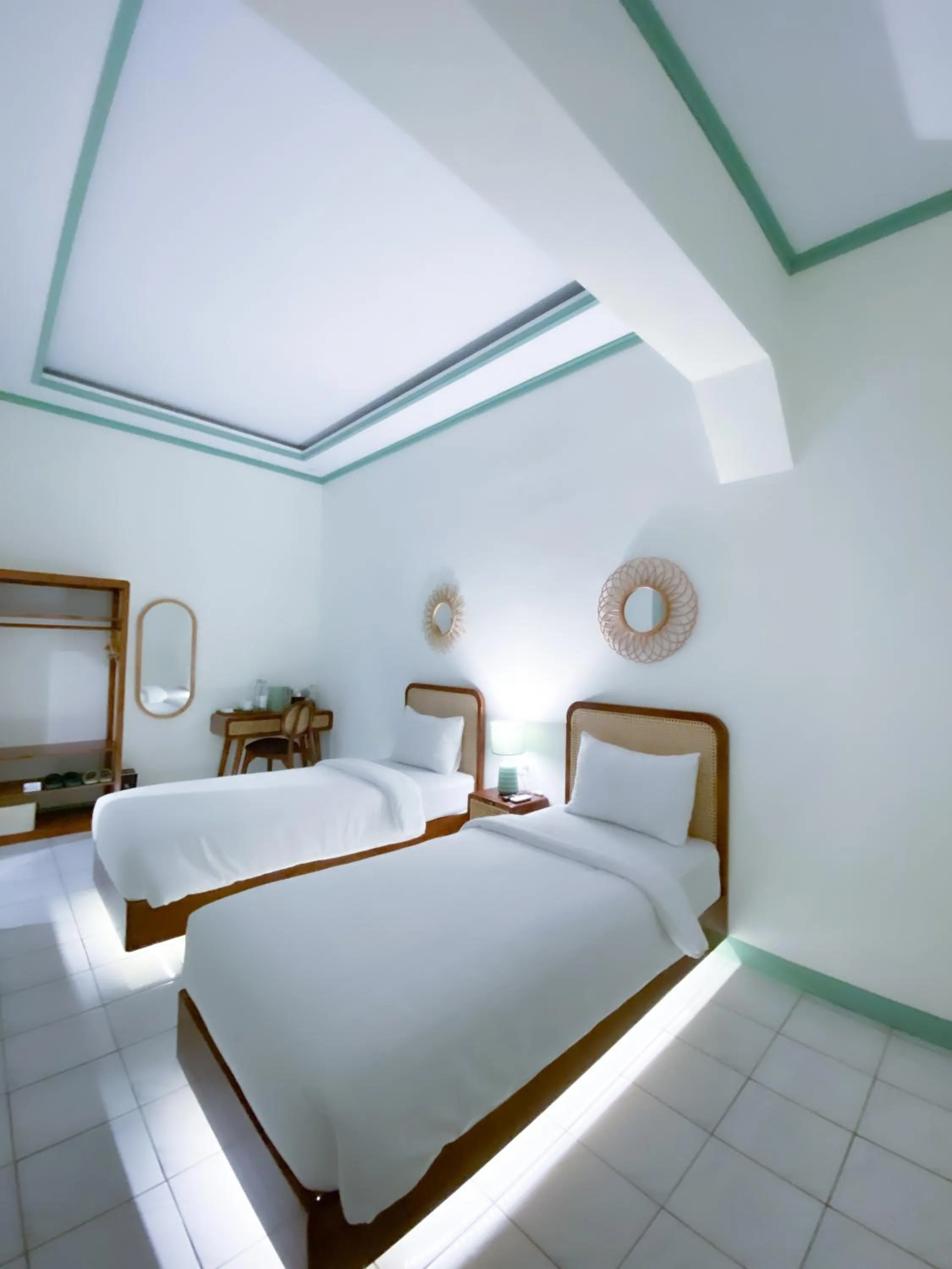 Bed in The Utara Hotel Tugu by Eresha Hospitality