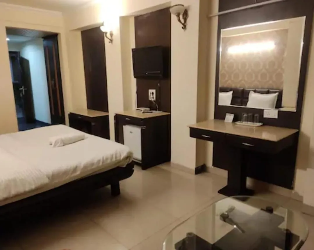 Bed in Hotel R S Residency