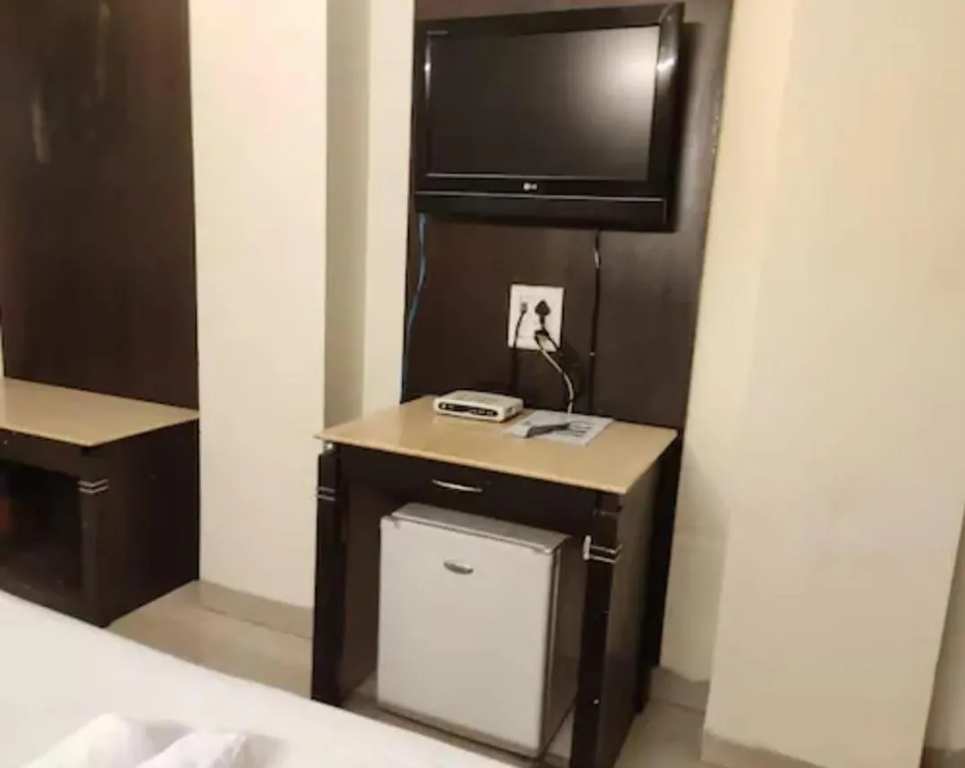 Bed in Hotel R S Residency