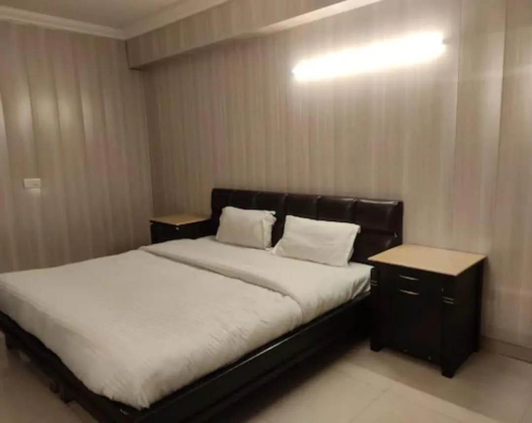 Bed in Hotel R S Residency