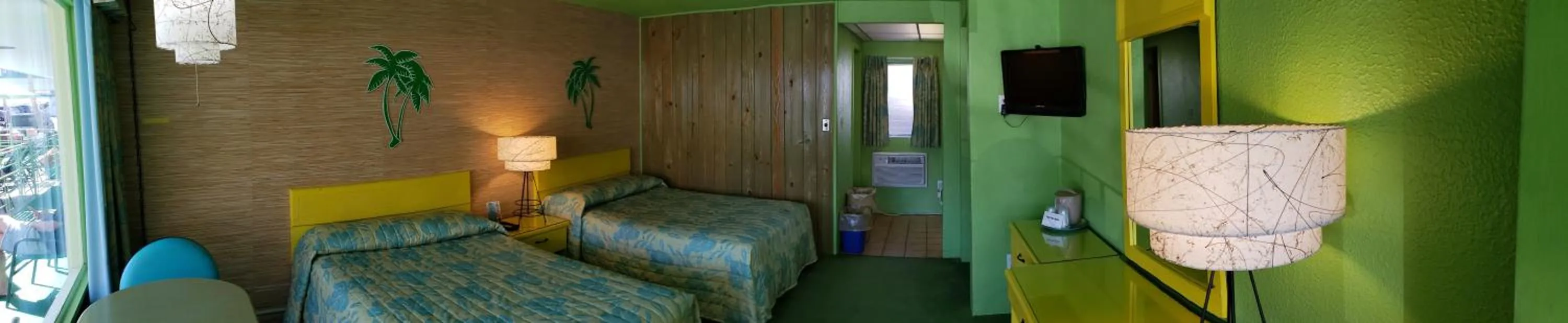 Bed in Caribbean Motel