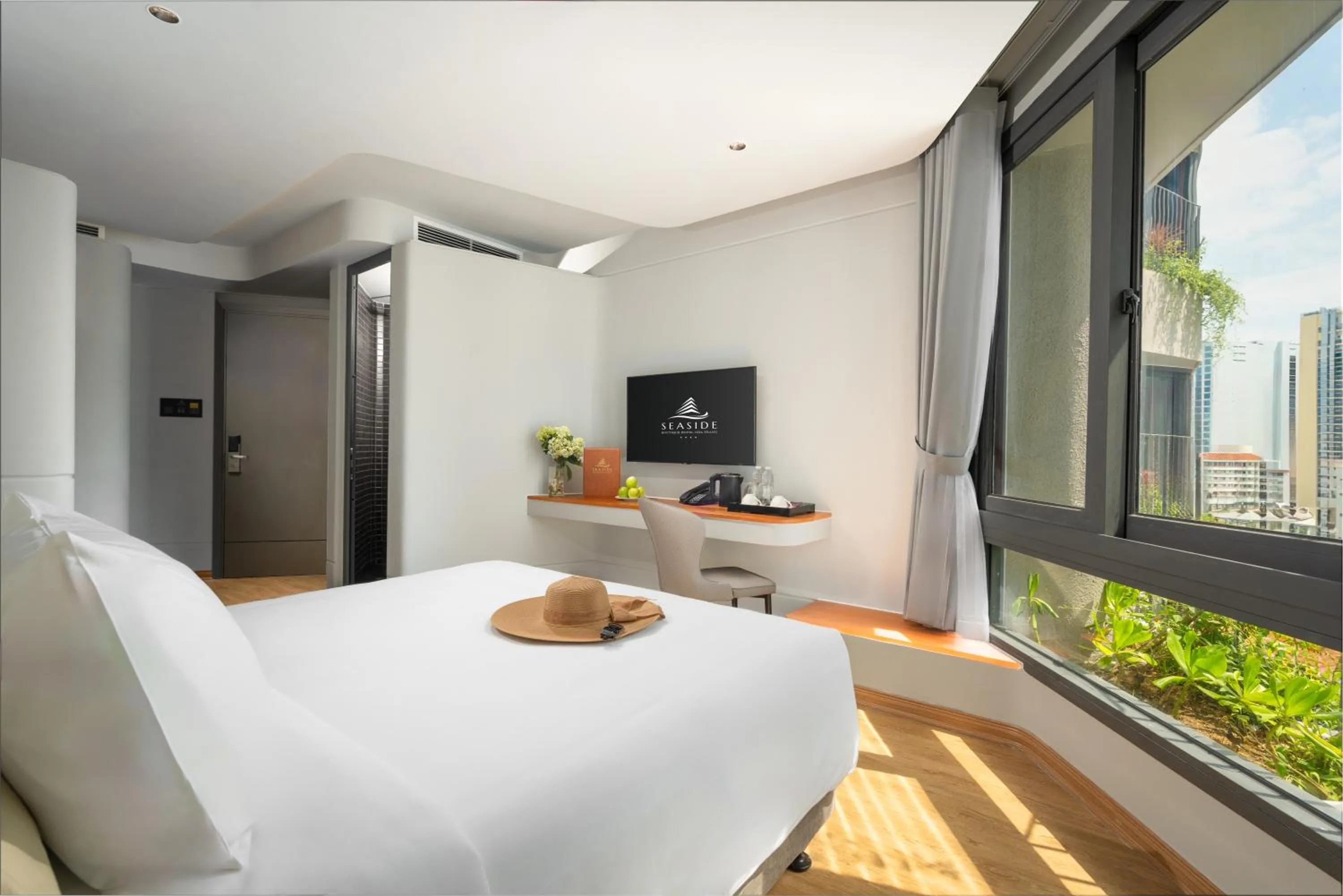 Photo of the whole room, Bed in Seaside Boutique Hotel Nha Trang Beach