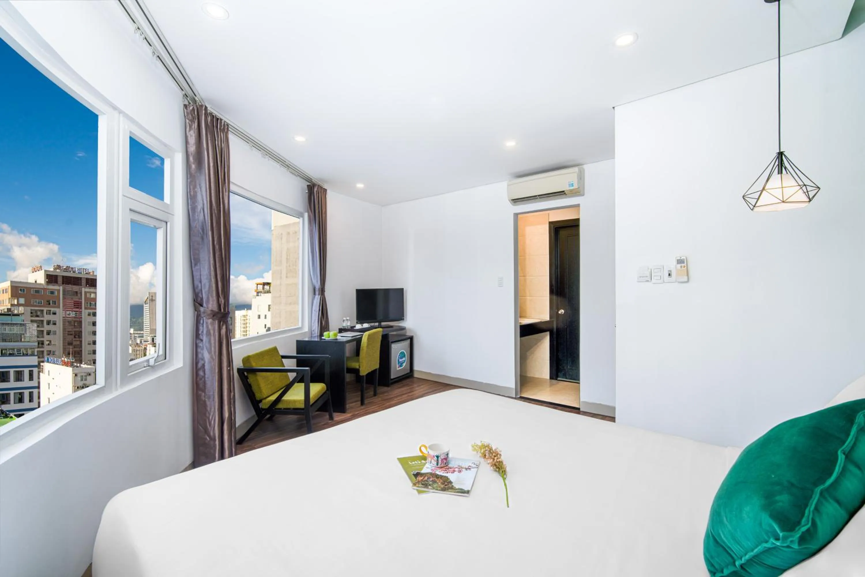 Communal lounge/ TV room, Bed in Golden Star Hotel by THG