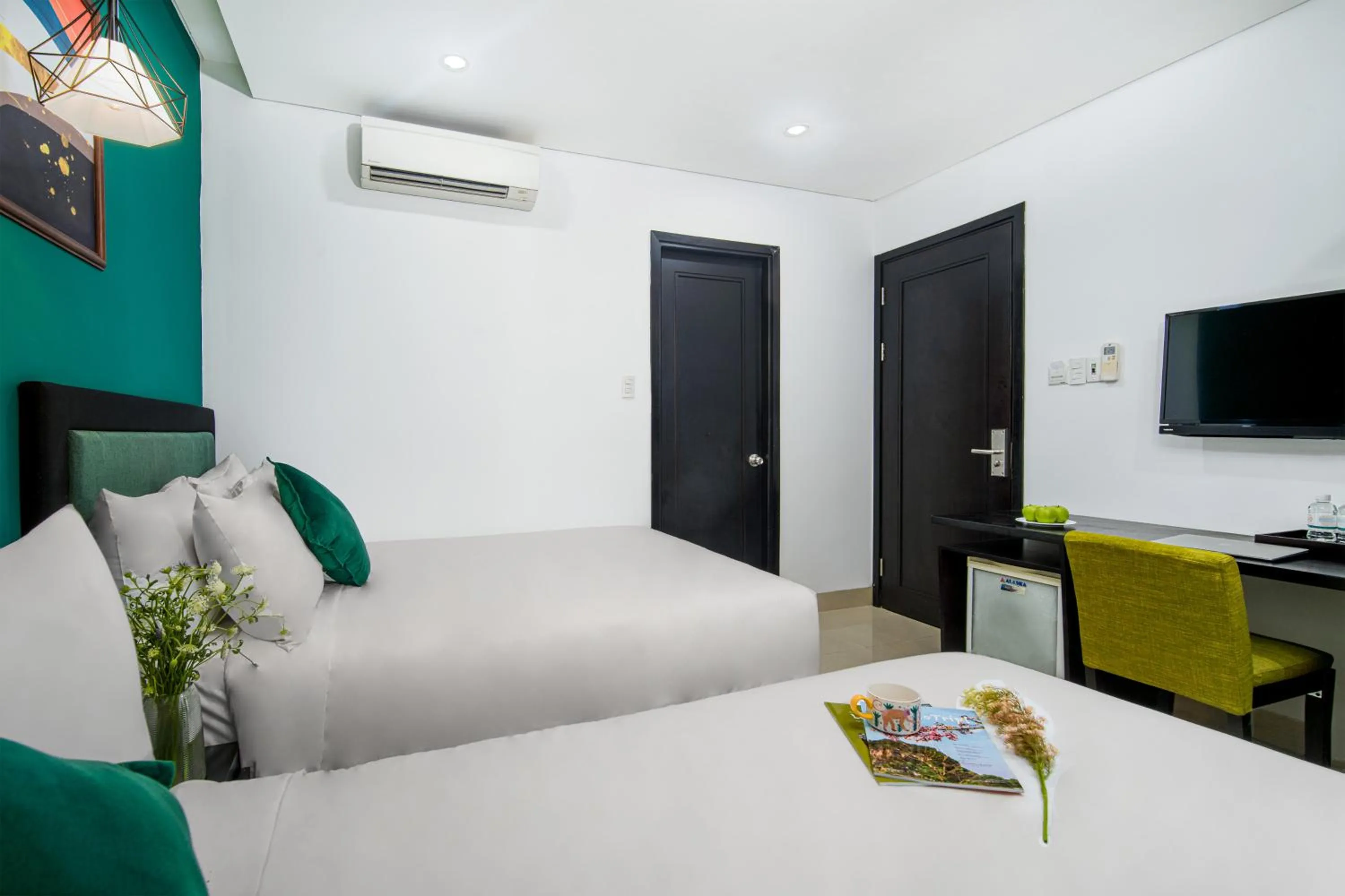 Communal lounge/ TV room, Bed in Golden Star Hotel by THG