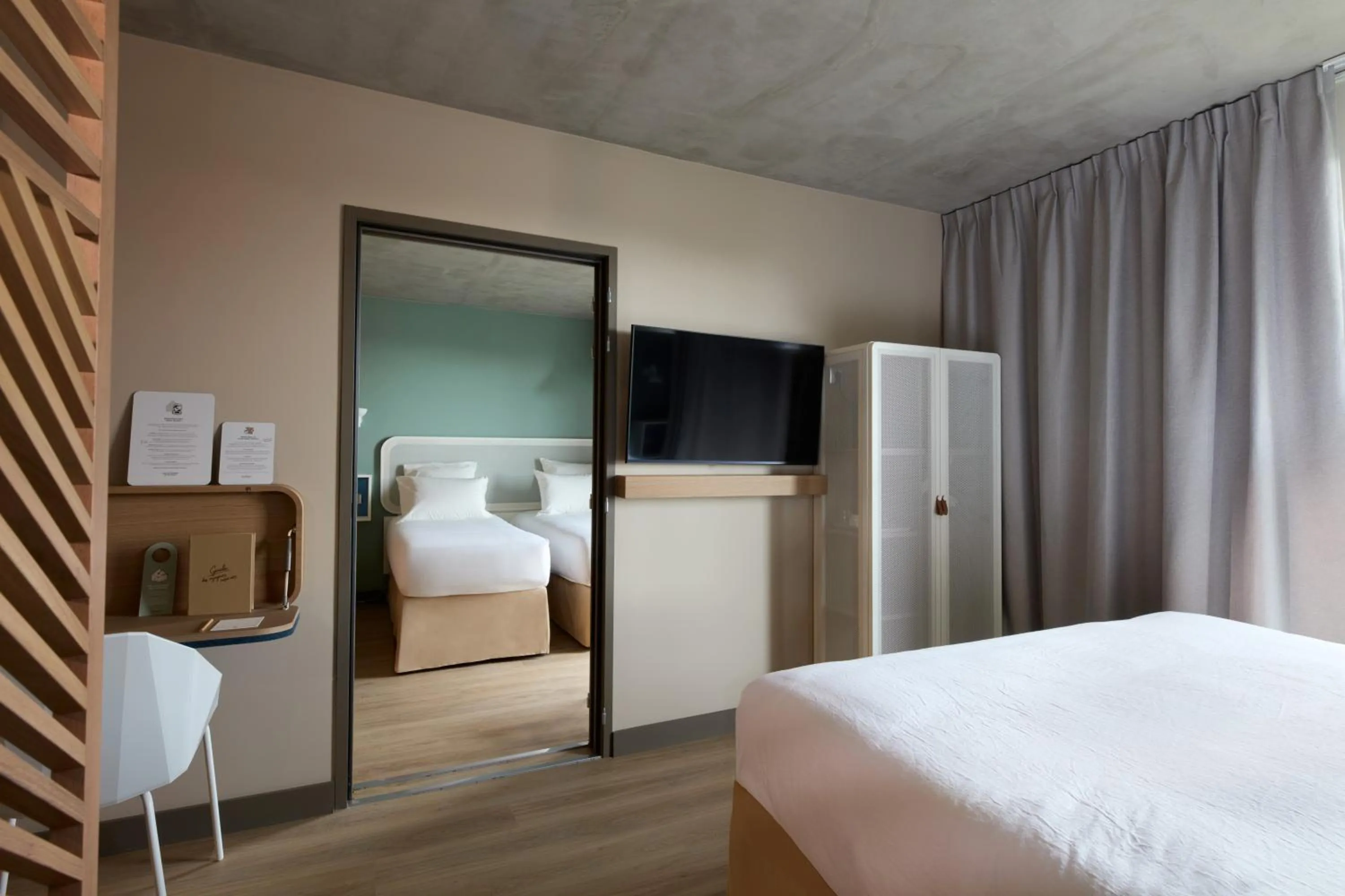 Photo of the whole room, Bed in OKKO Hotels Troyes Centre
