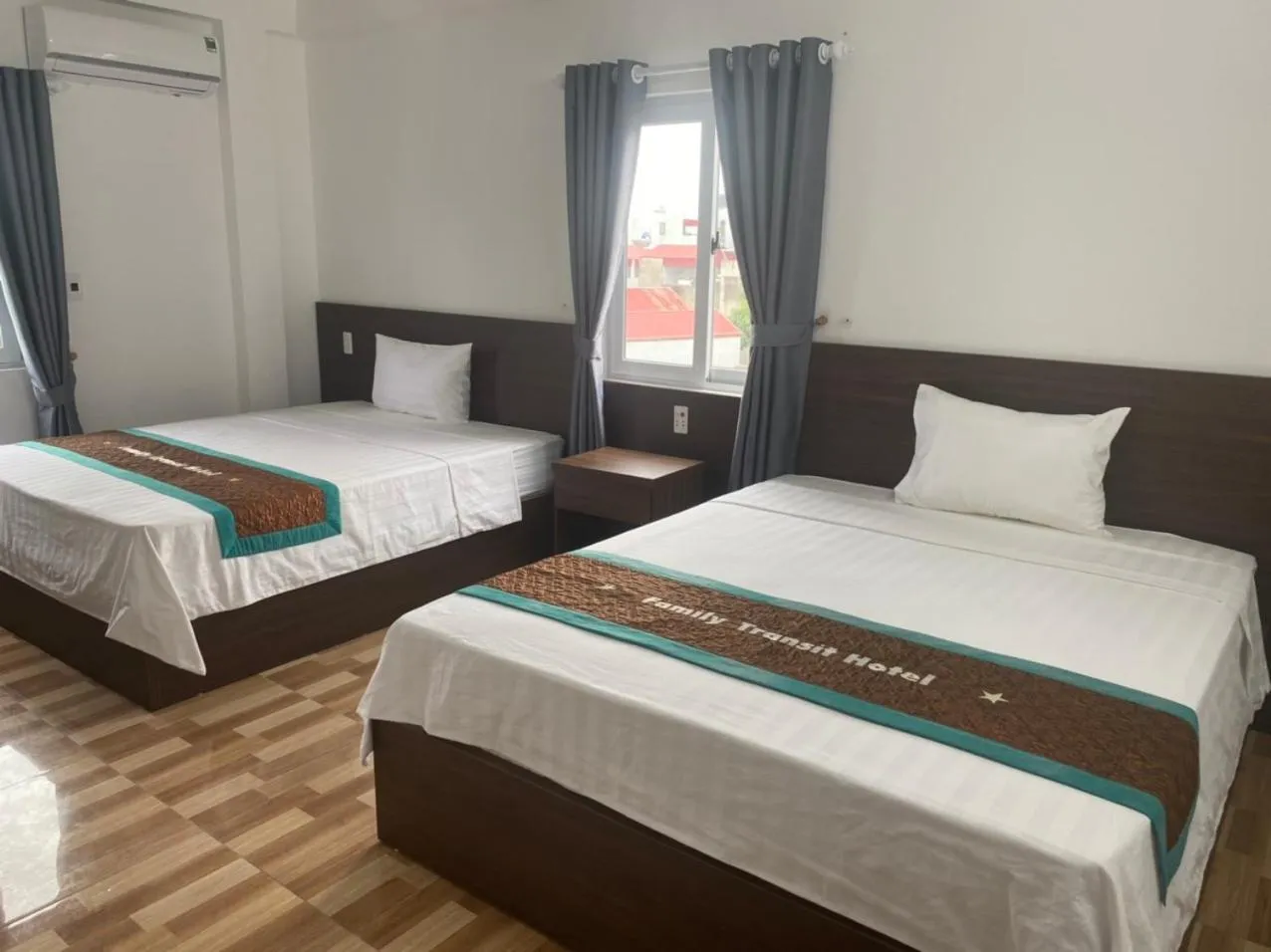 Bed in Family Transit Hotel