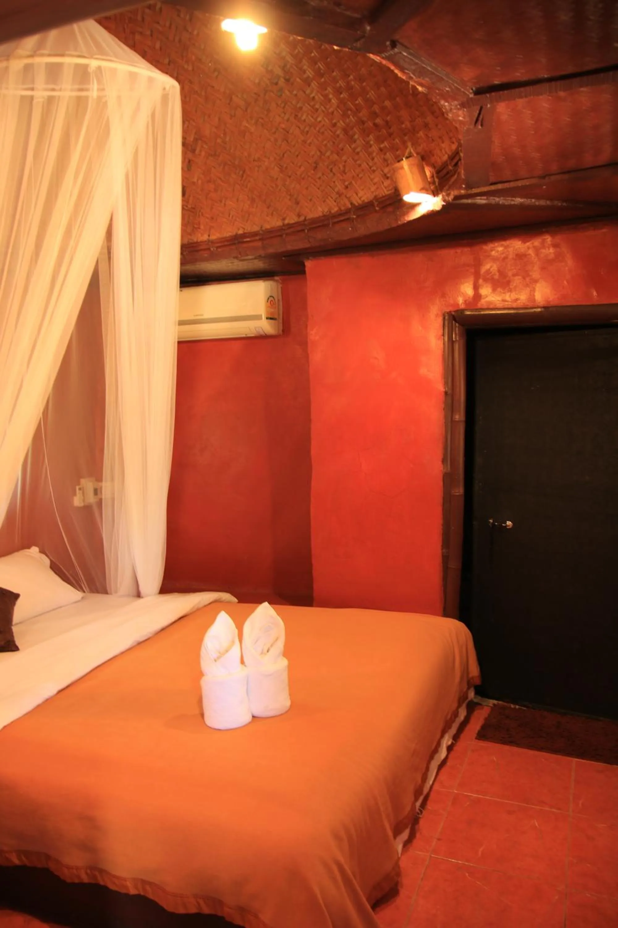 Bed in Ban Din Resort Chiang Rai