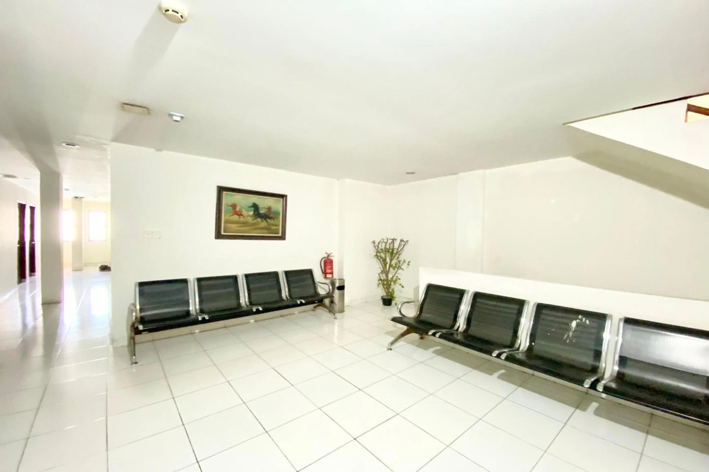 Seating area in Hotel O Jodoh Near Grand Batam Mall Formerly Agung Hotel