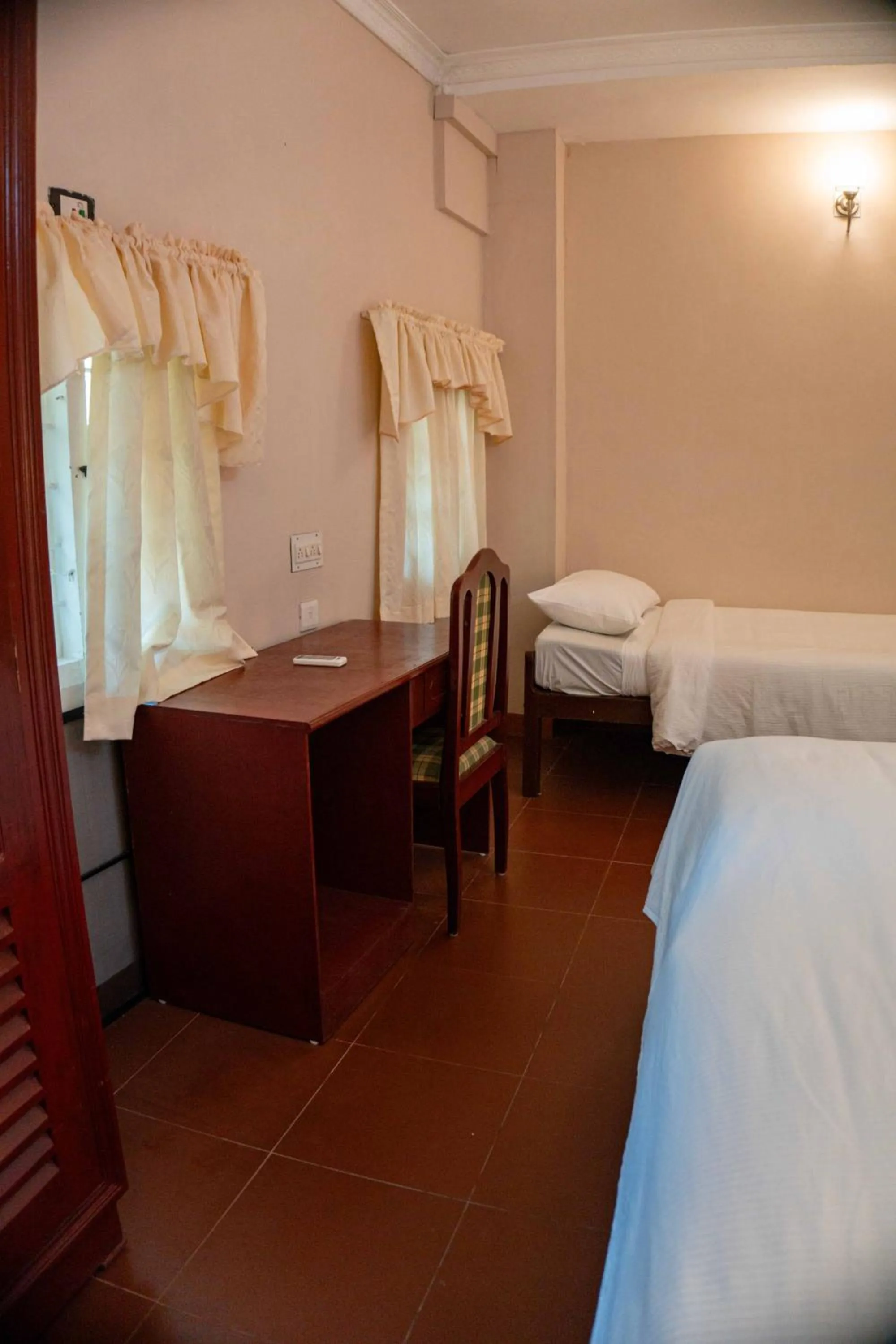 Bed in Gama Heritage Residency