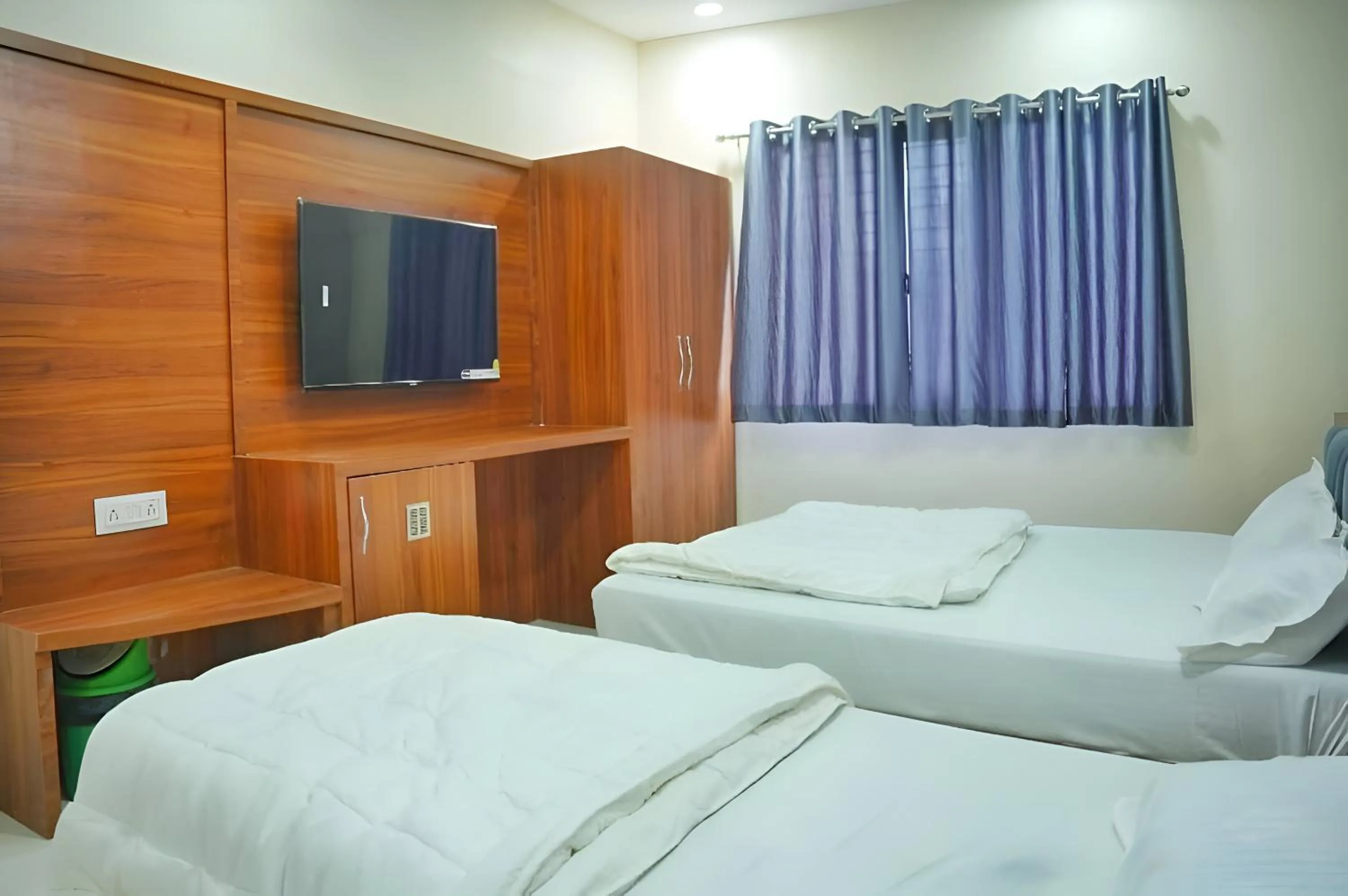 Bed in Hotel Dev Krishna Palace