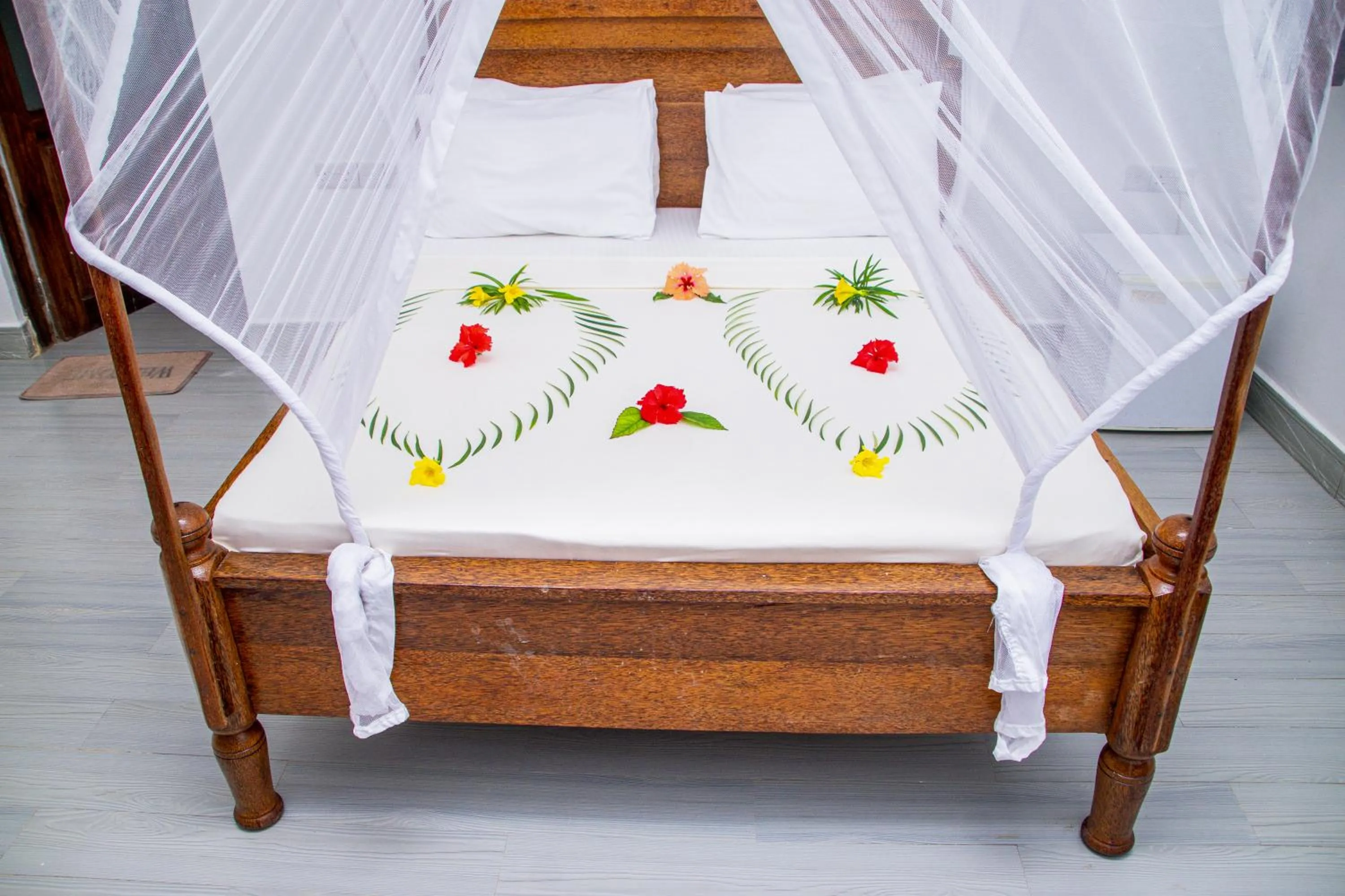 Bed in Amazing Beach Hotel Zanzibar