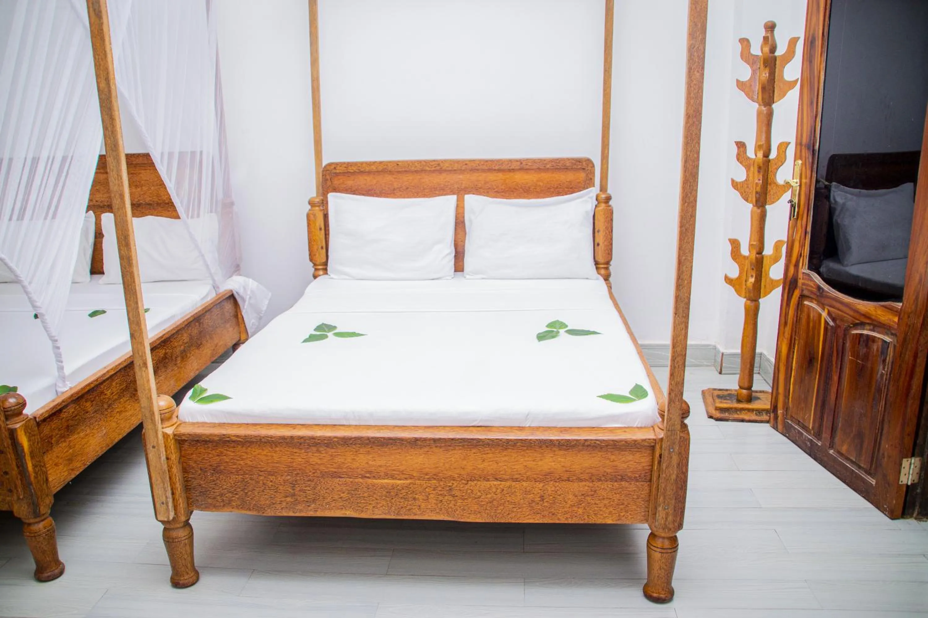 Bed in Amazing Beach Hotel Zanzibar