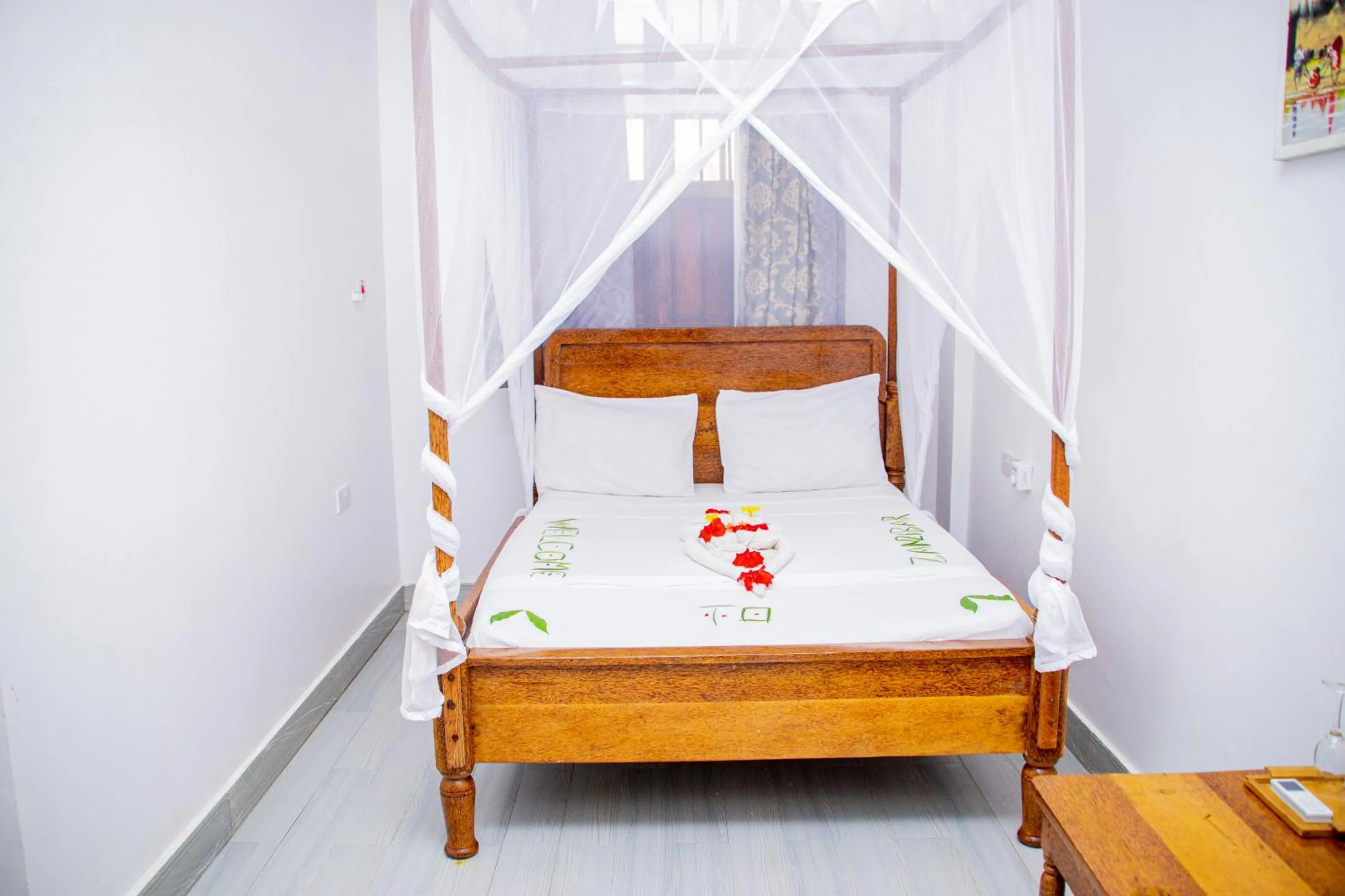 Bed in Amazing Beach Hotel Zanzibar