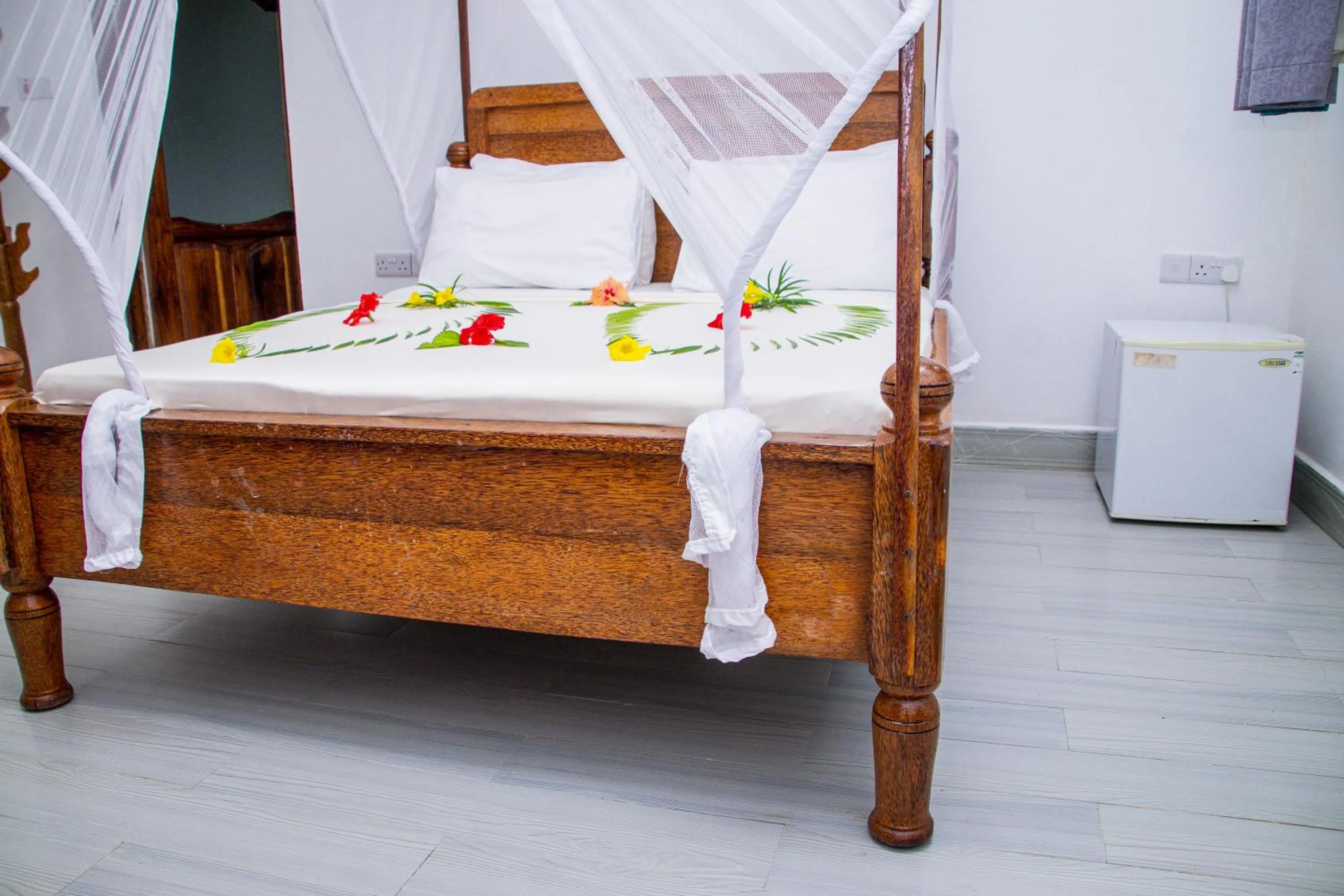 Photo of the whole room, Bed in Amazing Beach Hotel Zanzibar