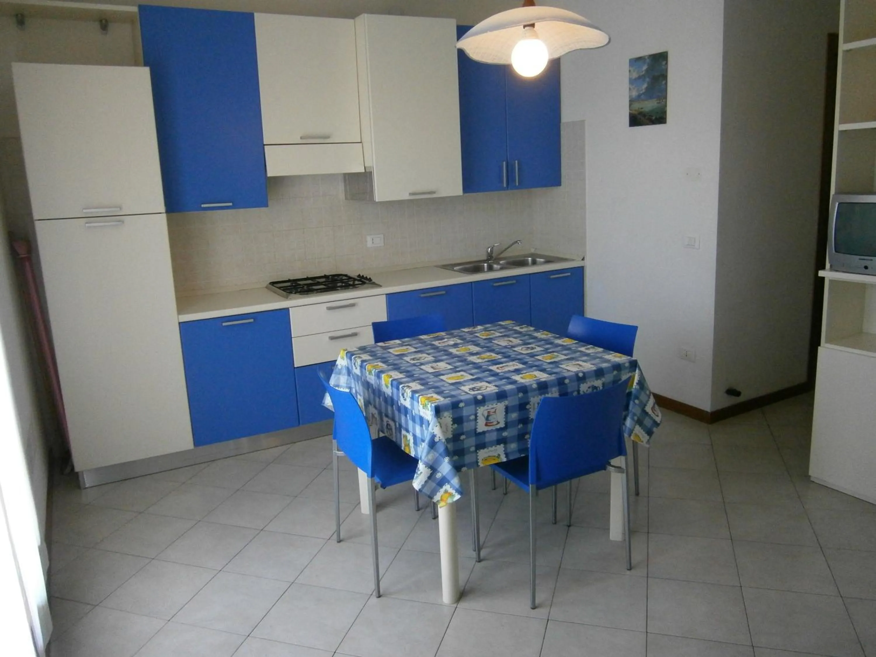 Kitchen or kitchenette in Villaggio dei Fiori - Agenzia Cocal