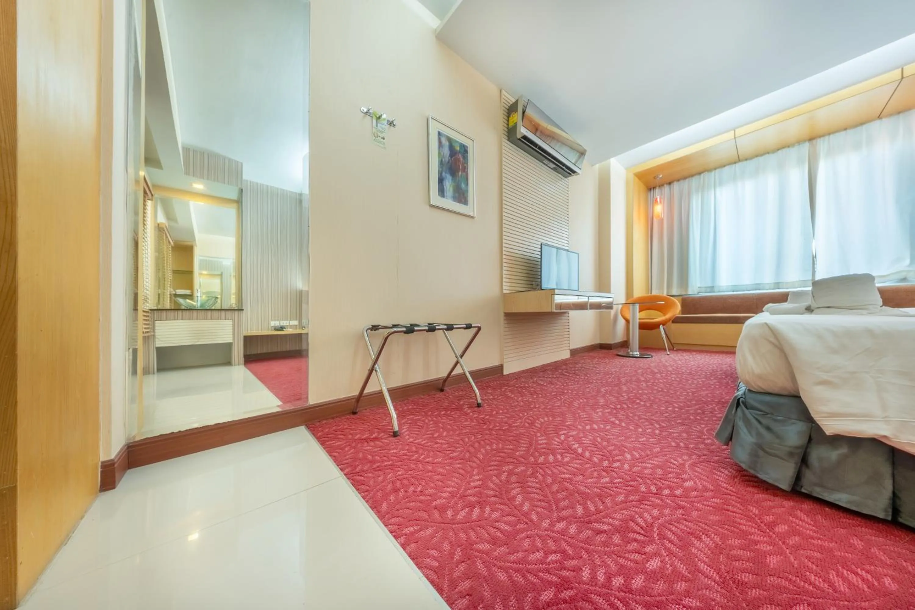 Bed in SHIN Hotel V-ONE Korat