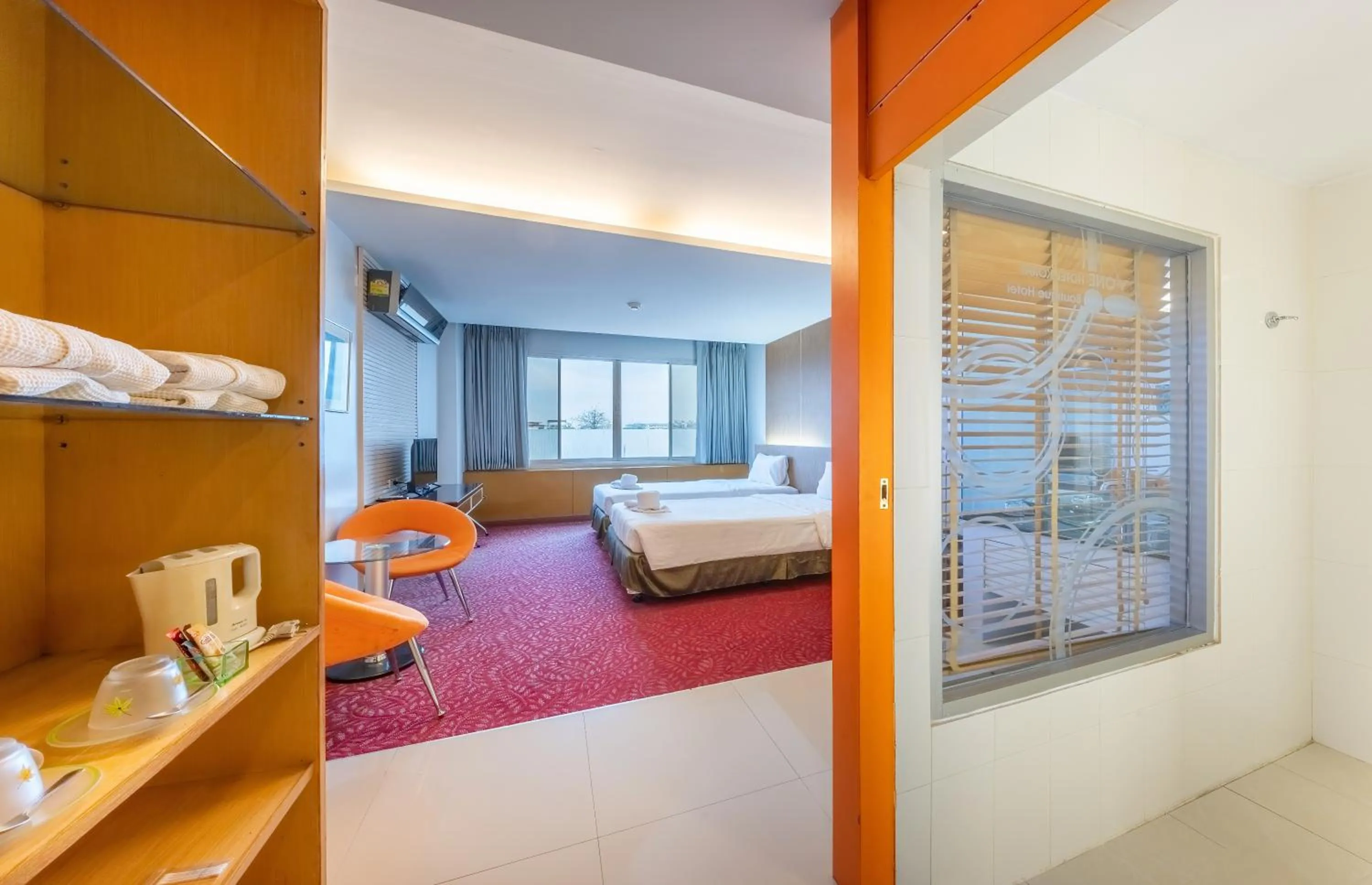 Photo of the whole room, Bed in SHIN Hotel V-ONE Korat