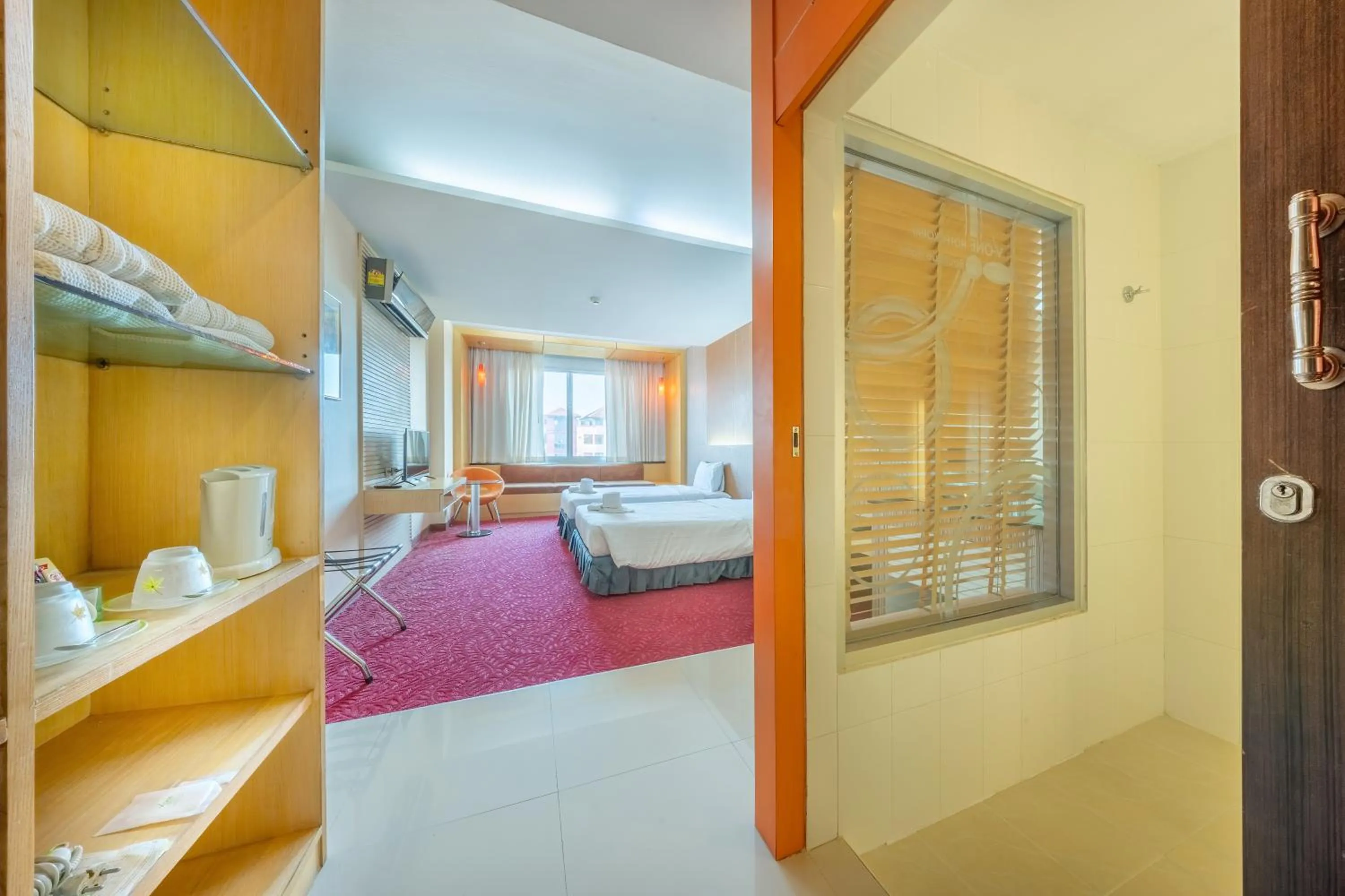 Photo of the whole room, Bed in SHIN Hotel V-ONE Korat