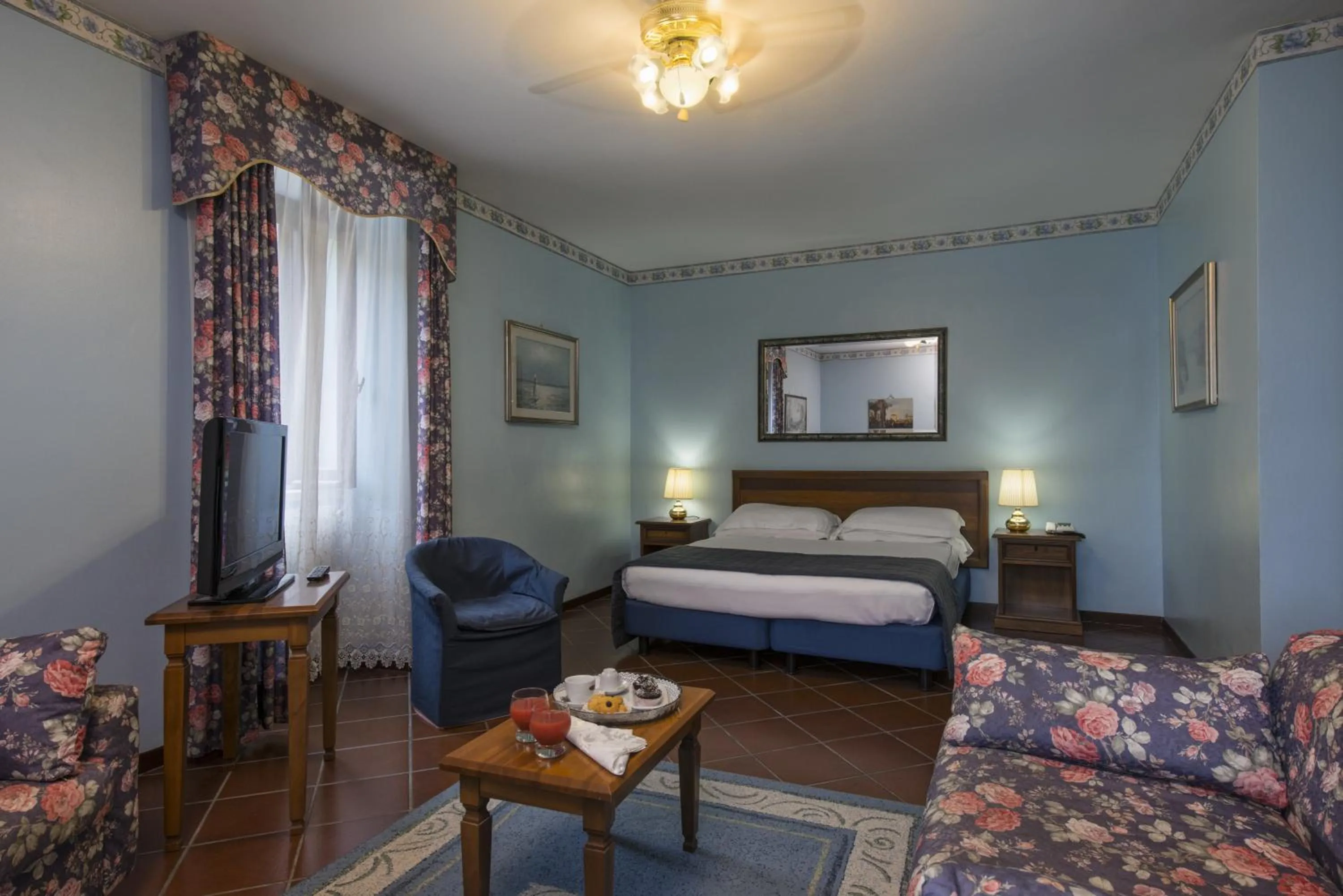 Living room, Bed in La Pineta Dei Liberti