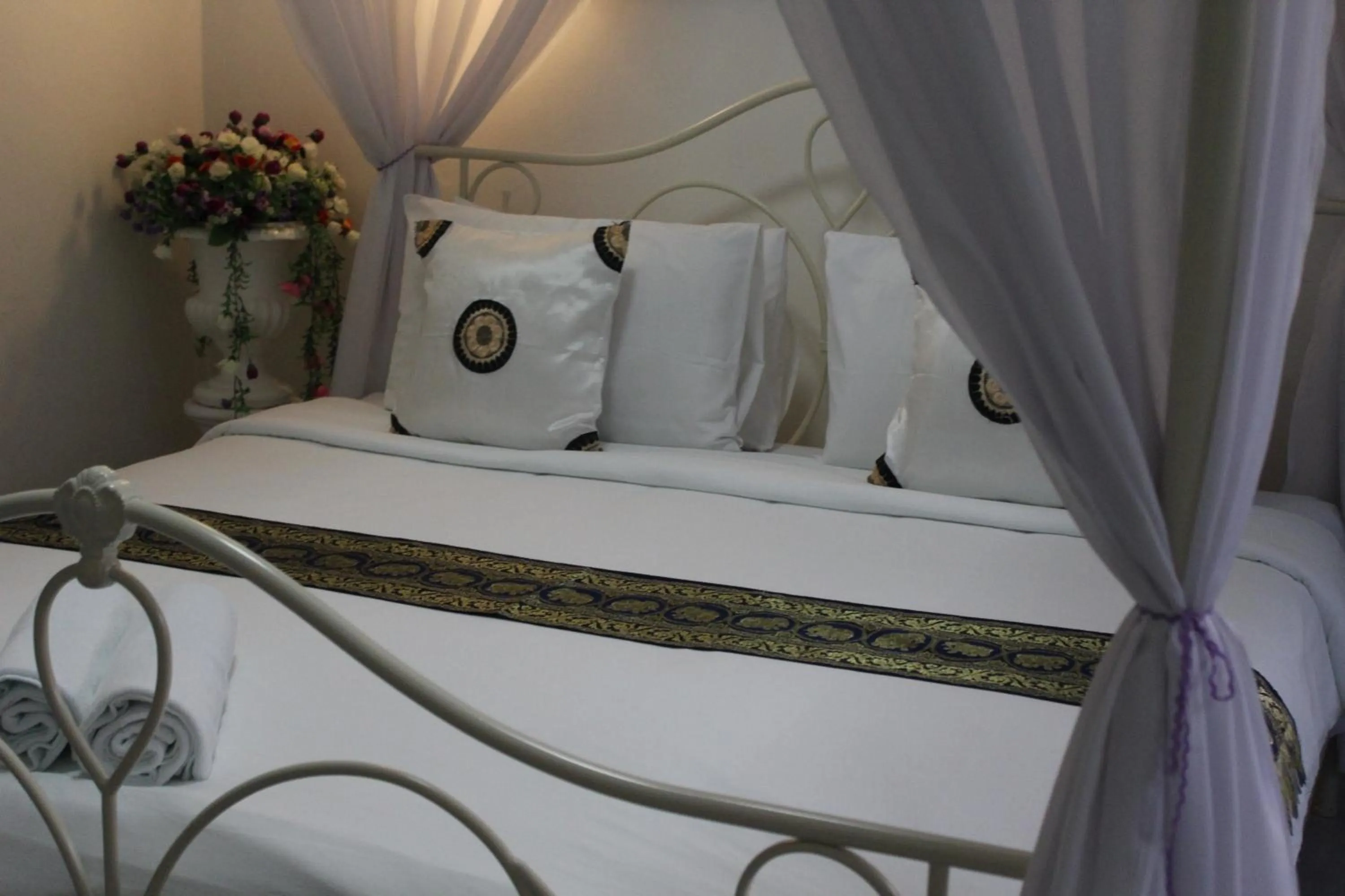 Photo of the whole room, Bed in White Elephant Resort