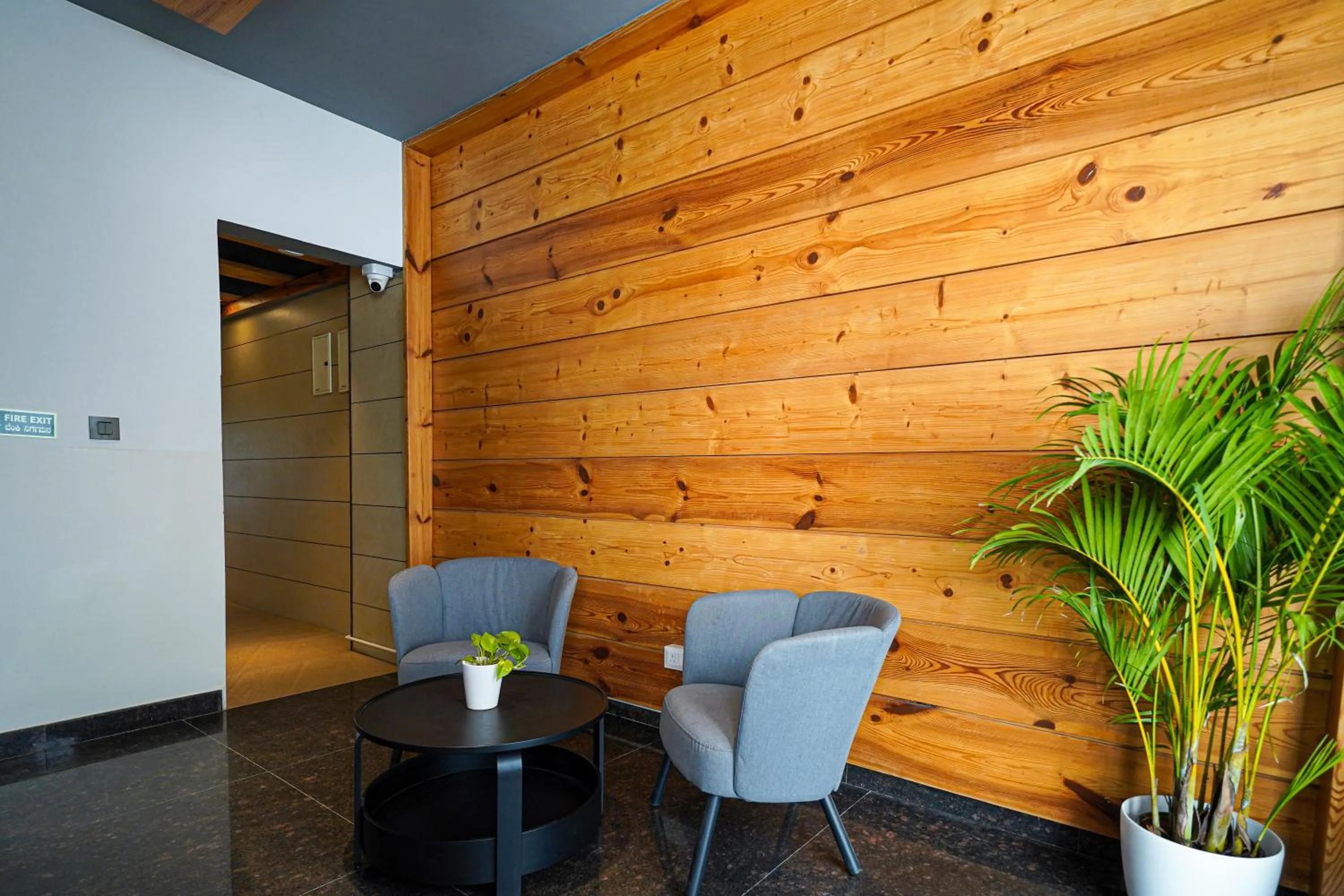 Seating area in Open Hotel by Olive - Moka