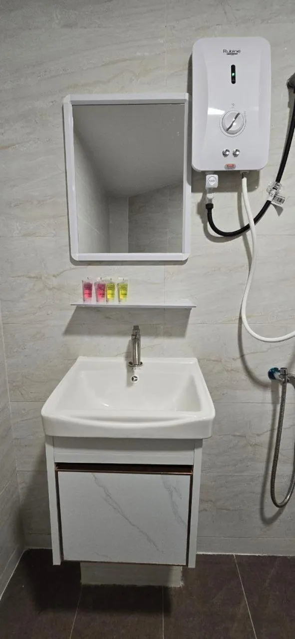 Bathroom in Enrich Hotel Semenyih by uBook