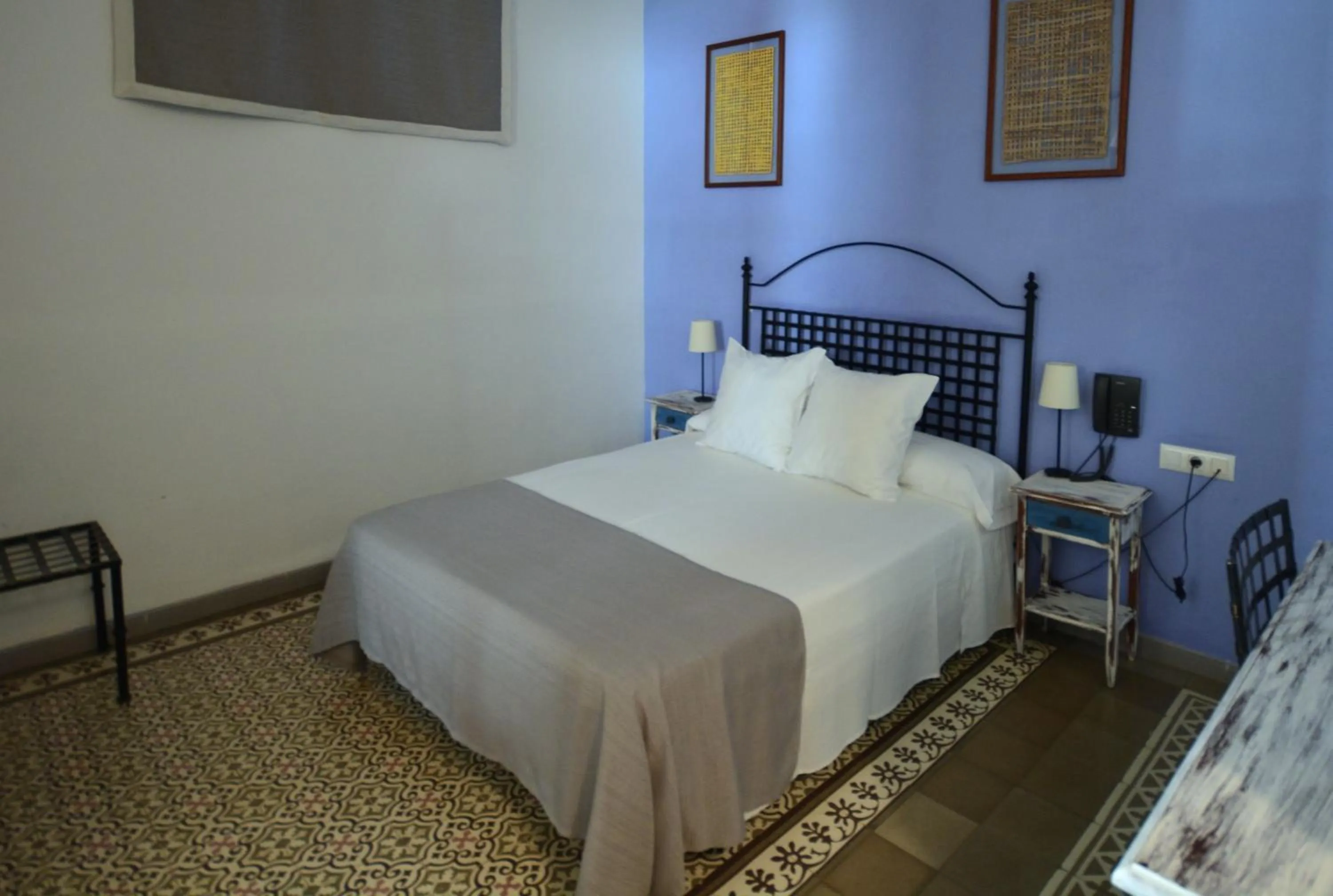 Bed in Hotel Casa de los Azulejos