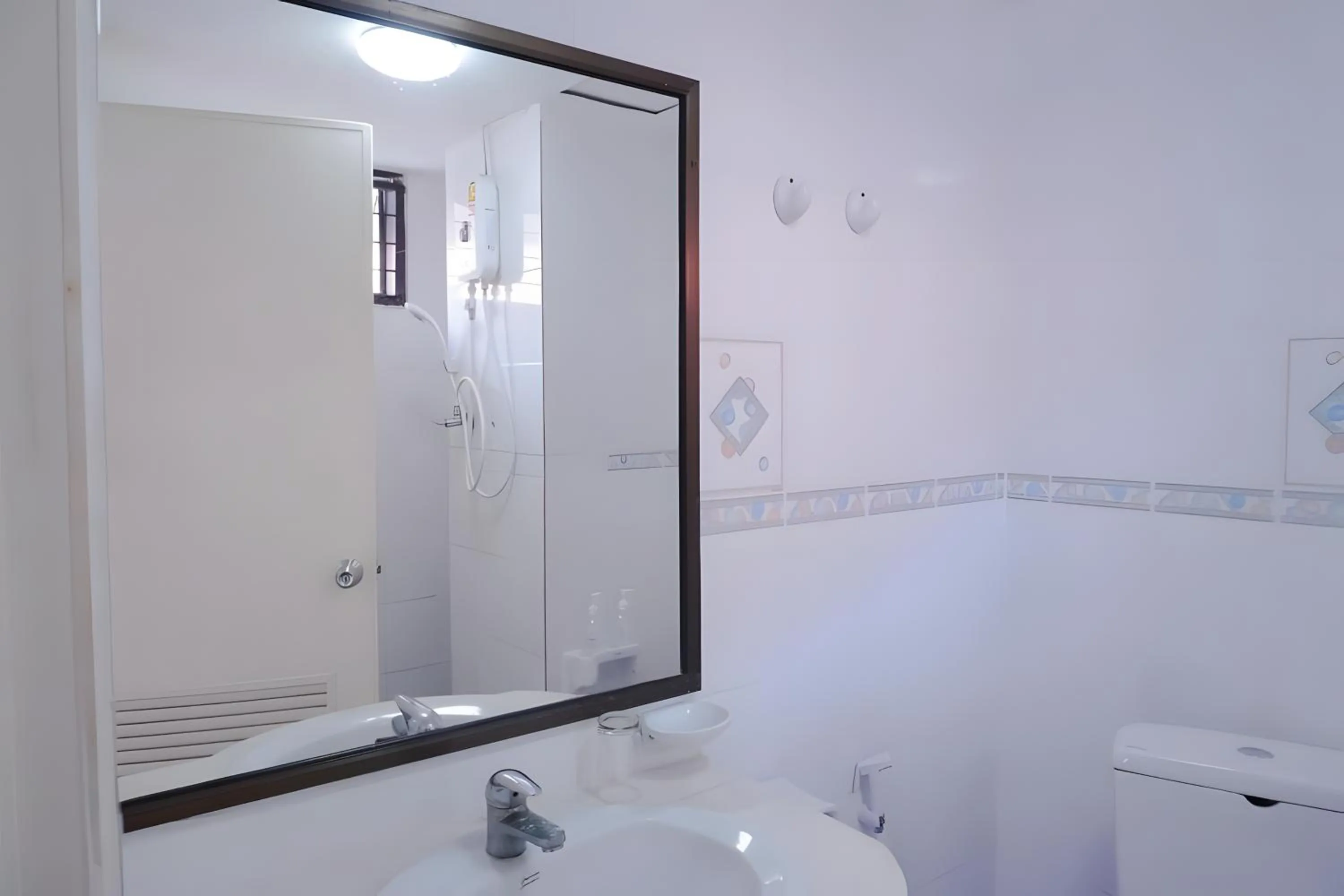 Toilet in XX GO INN Phuket Patong Beach