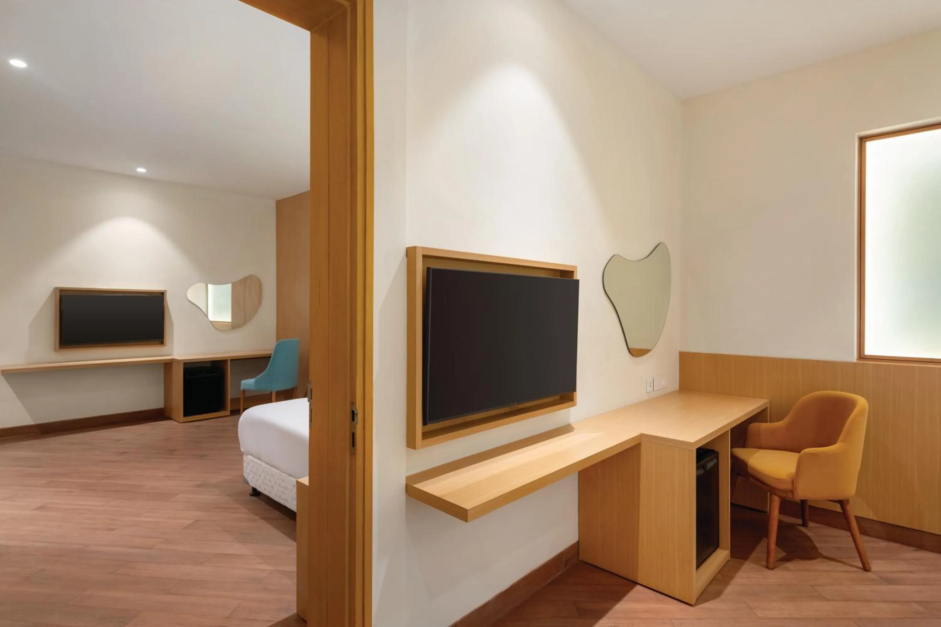 Bed in Ramada Encore by Wyndham Lucknow Airport