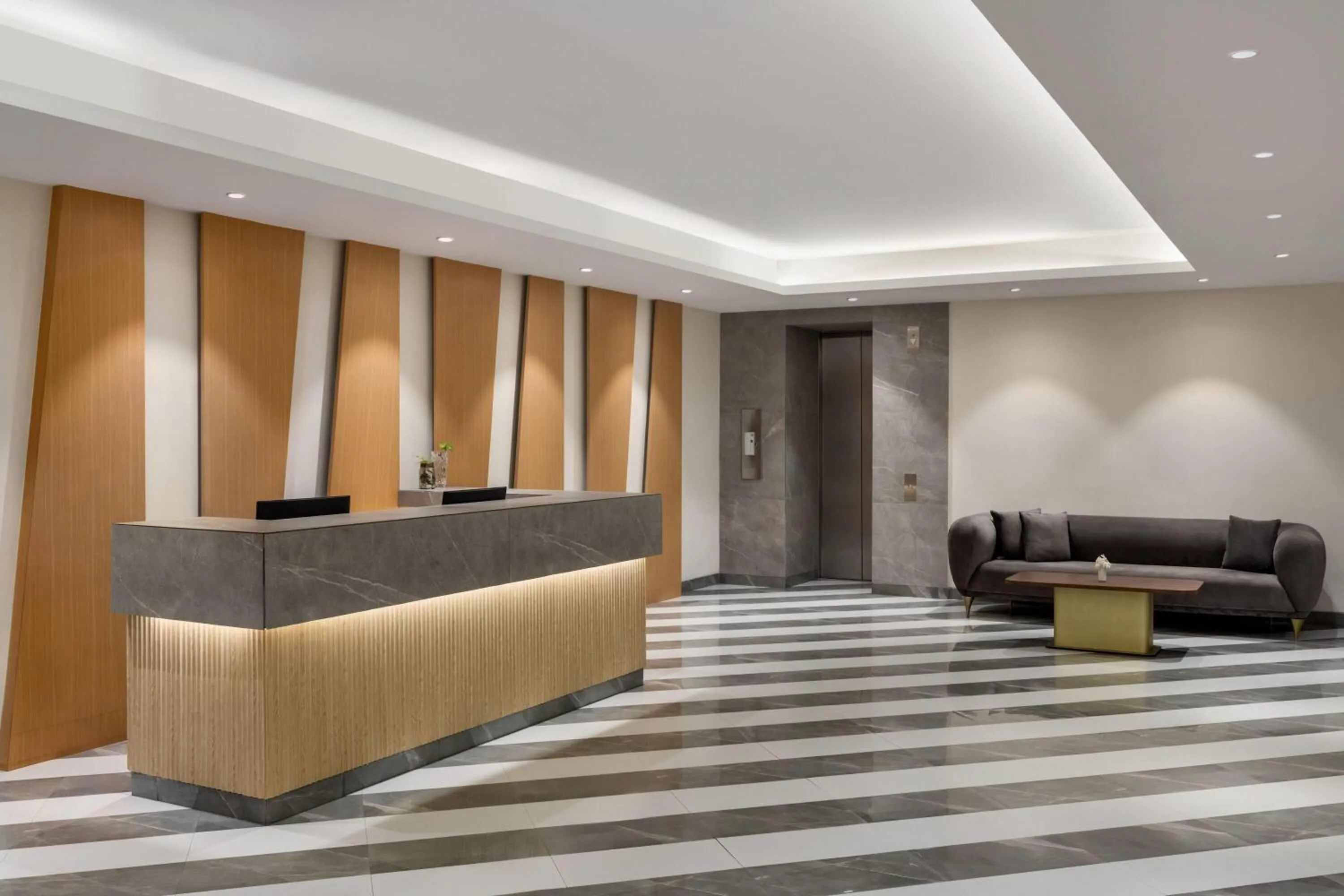 Lobby or reception in Ramada Encore by Wyndham Lucknow Airport